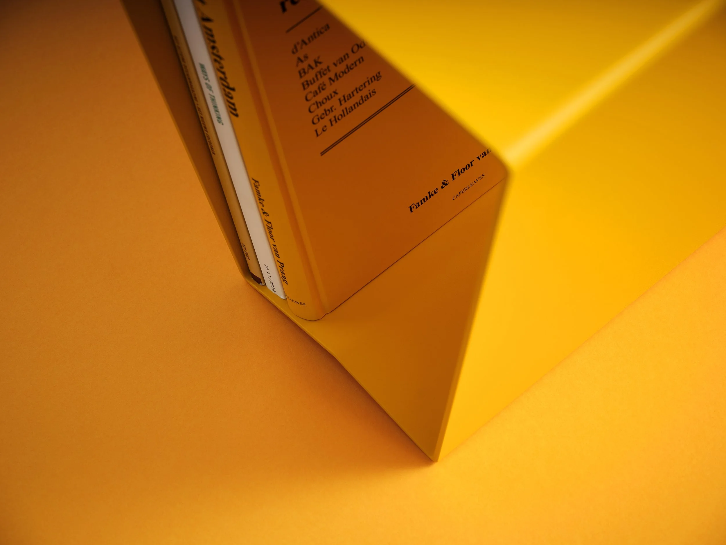 an abstract image of an orange paper rack on a bright orange background