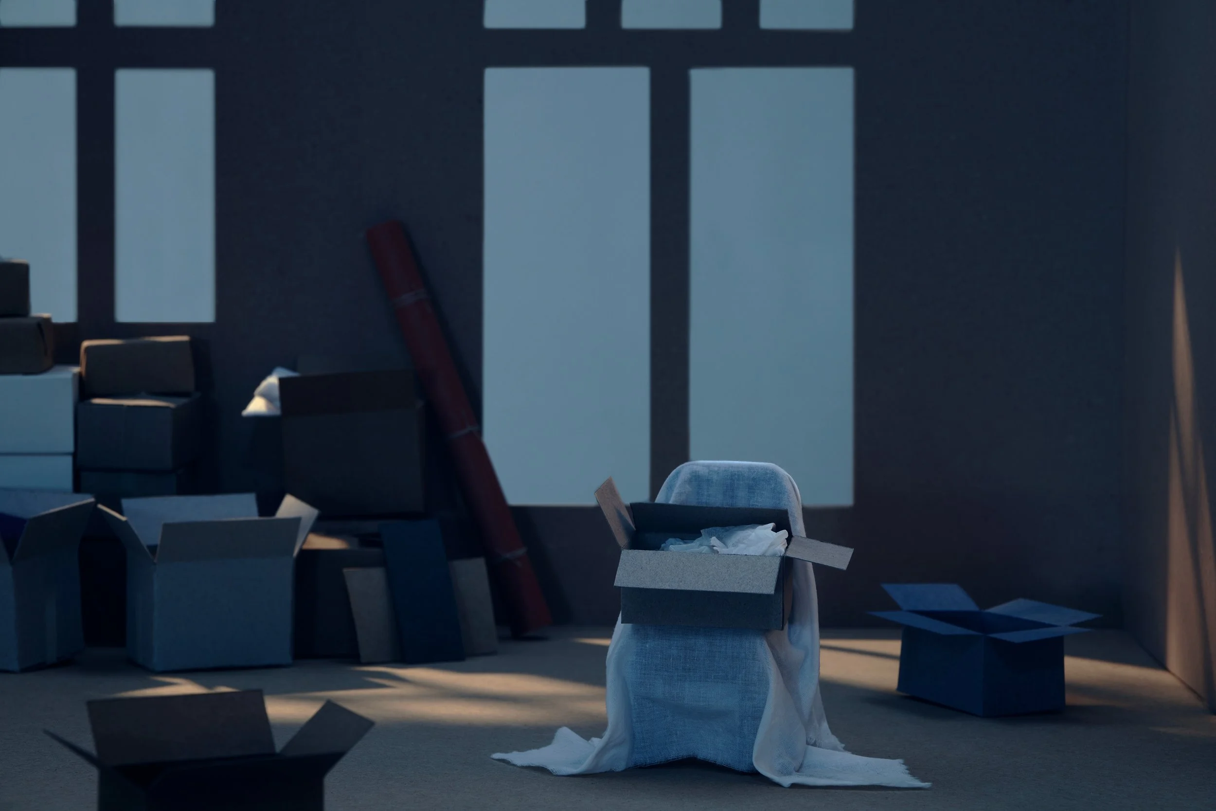 interior made of recycled cardboard, in this image the absent people are moving. Boxes stacked up.