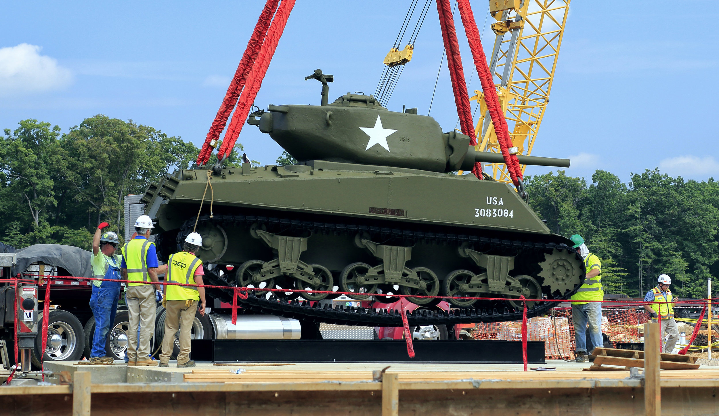 D&P and Clark Construction install Sherman tank. August 3, 2017