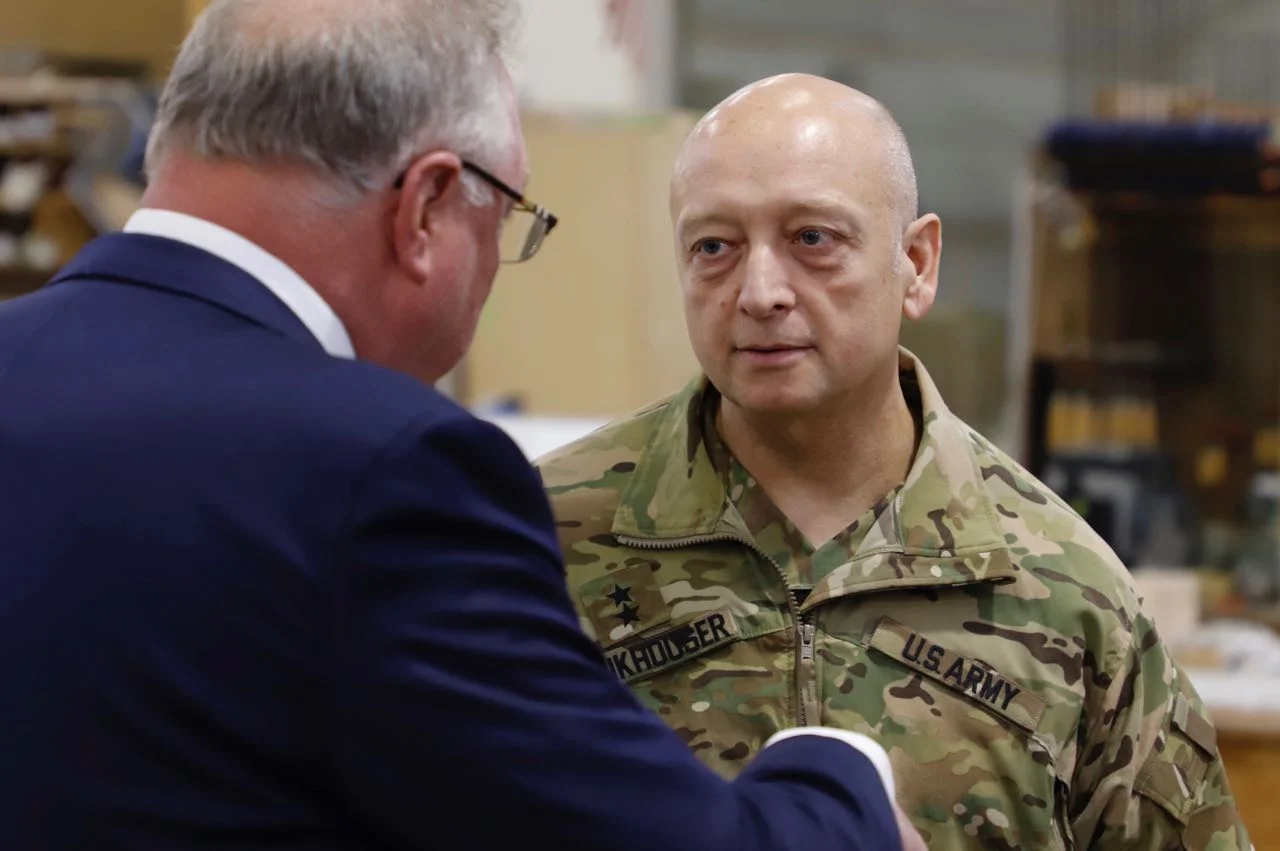 Design and Production Incorporated company president J.F. Barnwell welcomes MG Anthony C. Funkhouser to tour D&P’s production facilities.