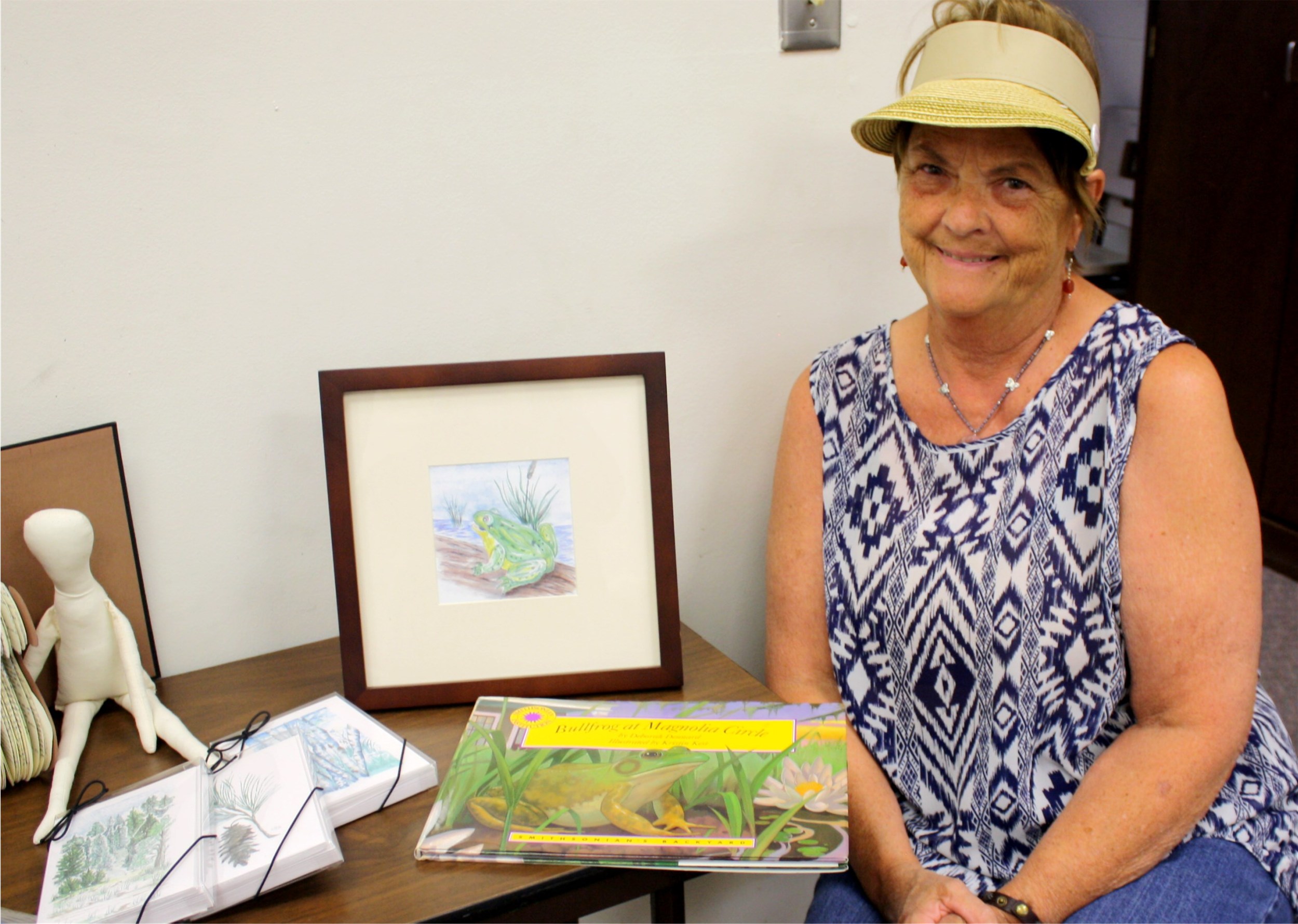 Framed Frog Print and "Bullfrog of Magnolia Circle" book by June Shephard Reserve: $30