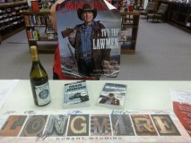 "Longmire" books, wine, and autographsdonated by Carol Fritzler