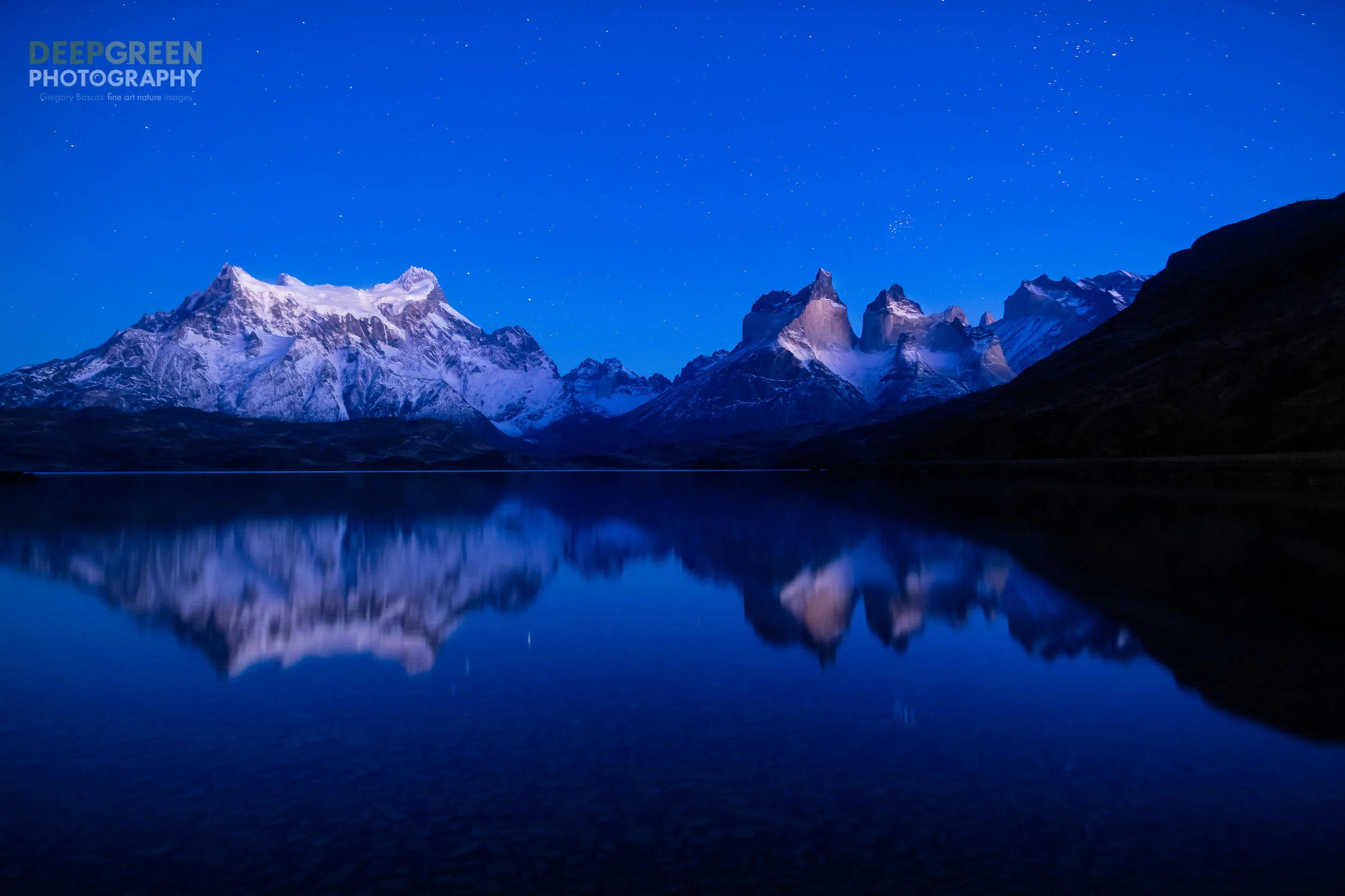 Chile's Torres del Paine National Park is an amazing place. While leaving my lodge before dawn to photograph a sunrise at a different locale, I was drawn to this placid scene of a starry sky with the famed "Horns of the Paine" reflected in a calm lake about an hour before the sun came up over the horizon. I missed my planned sunrise shot but it was totally worth it!
Canon 5DsR, Rokinon 24 mm f/1.4 lens, Induro tripod, cable release, f/11, 13 seconds, ISO 1000