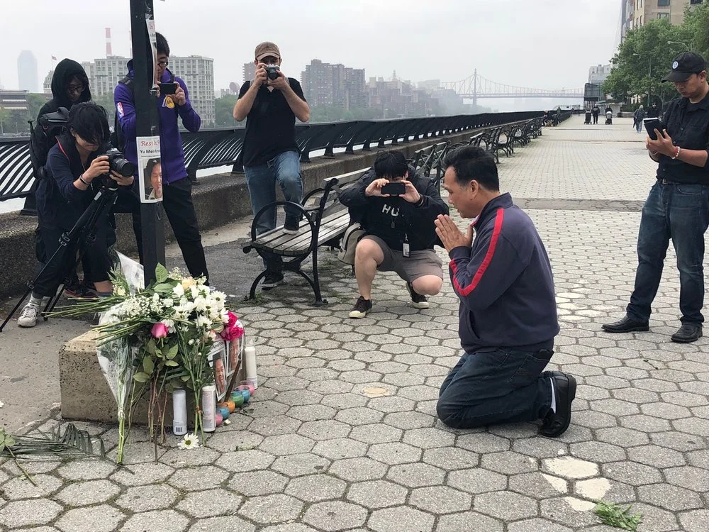Richard Chow, Brother of Kenny Chow, praying at vigil on May 27th, overlooking the East River at 86th St & East End Avenue.