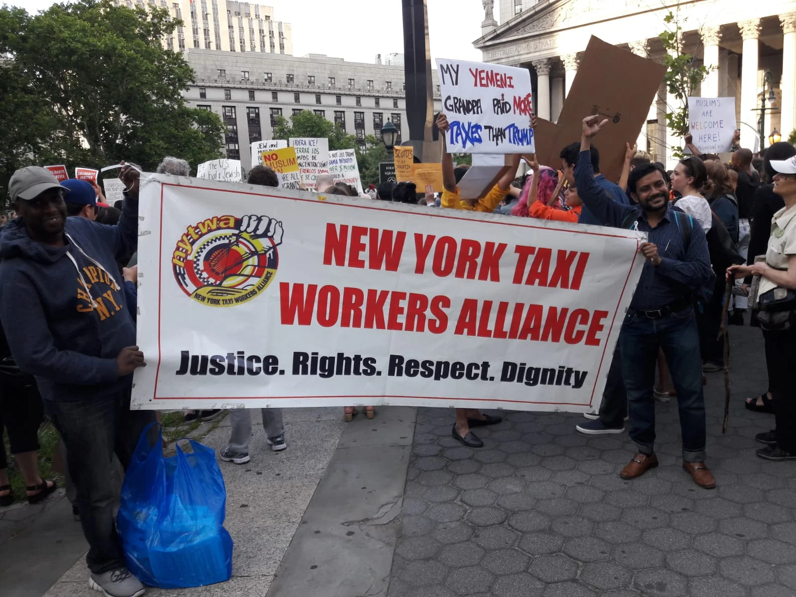 NYTWA Members stand in solidarity at Foley Square protest against Muslim Ban