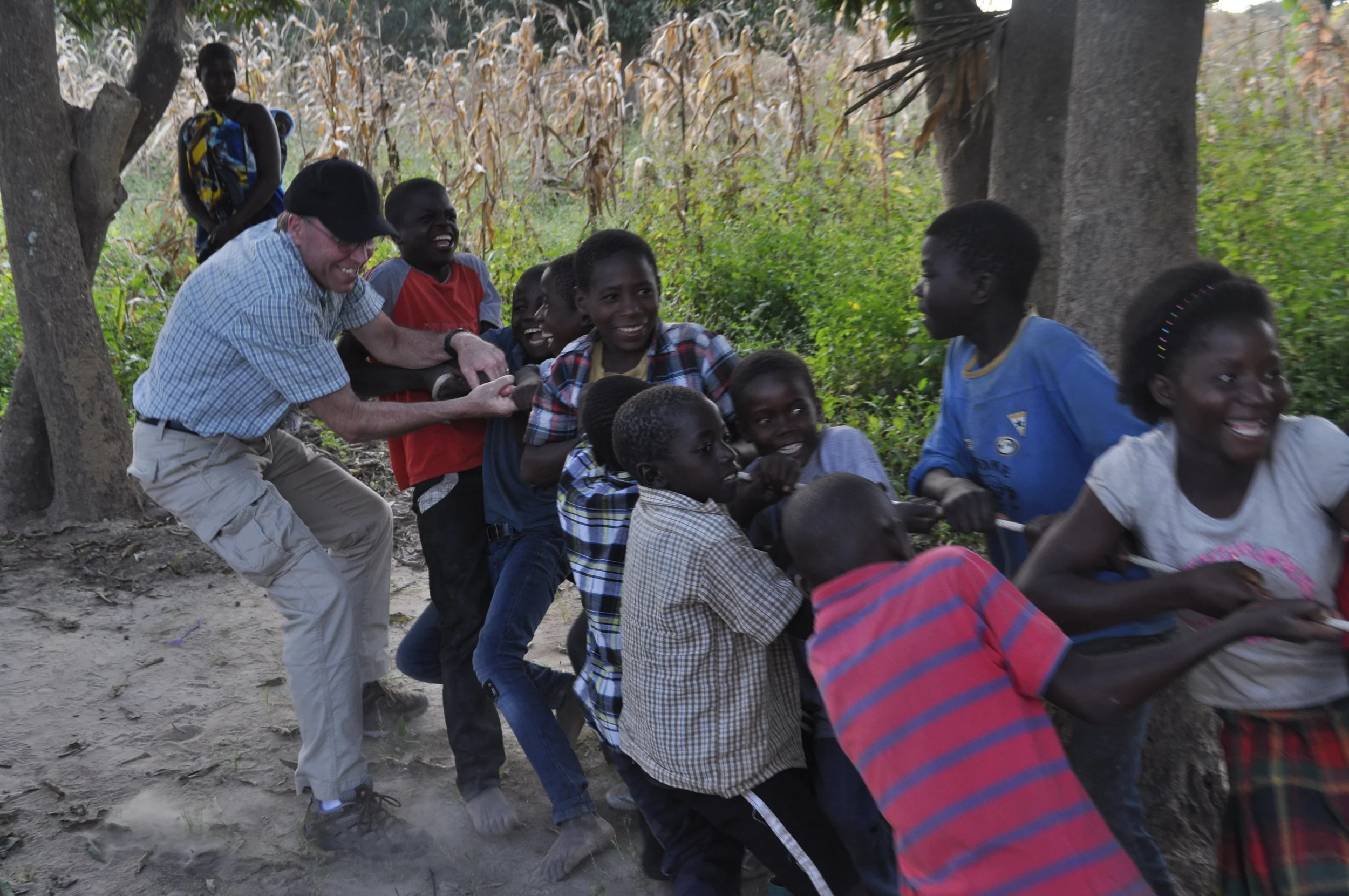 Tony playing with Kunchubwe kids in 2014