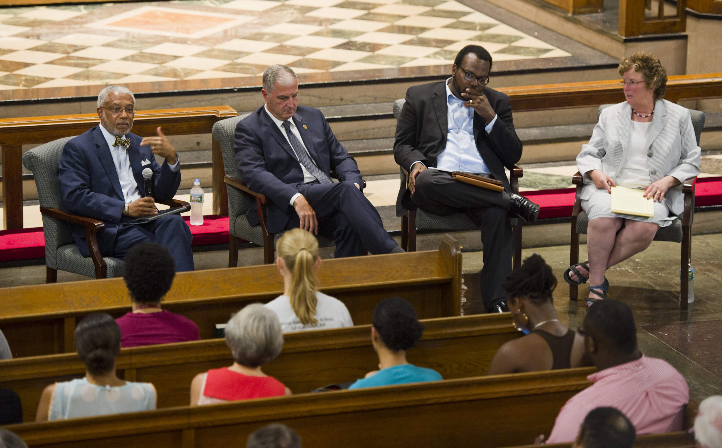  At a forum to discuss the events in Ferguson, MO, citizenship, and social change at Marsh Chapel September 3, 2014, the panel members were Dr Walter E Fluker, Martin Luther King, Jr. Professor of Ethical Leadership, from left, Capt Thomas Robbins, B