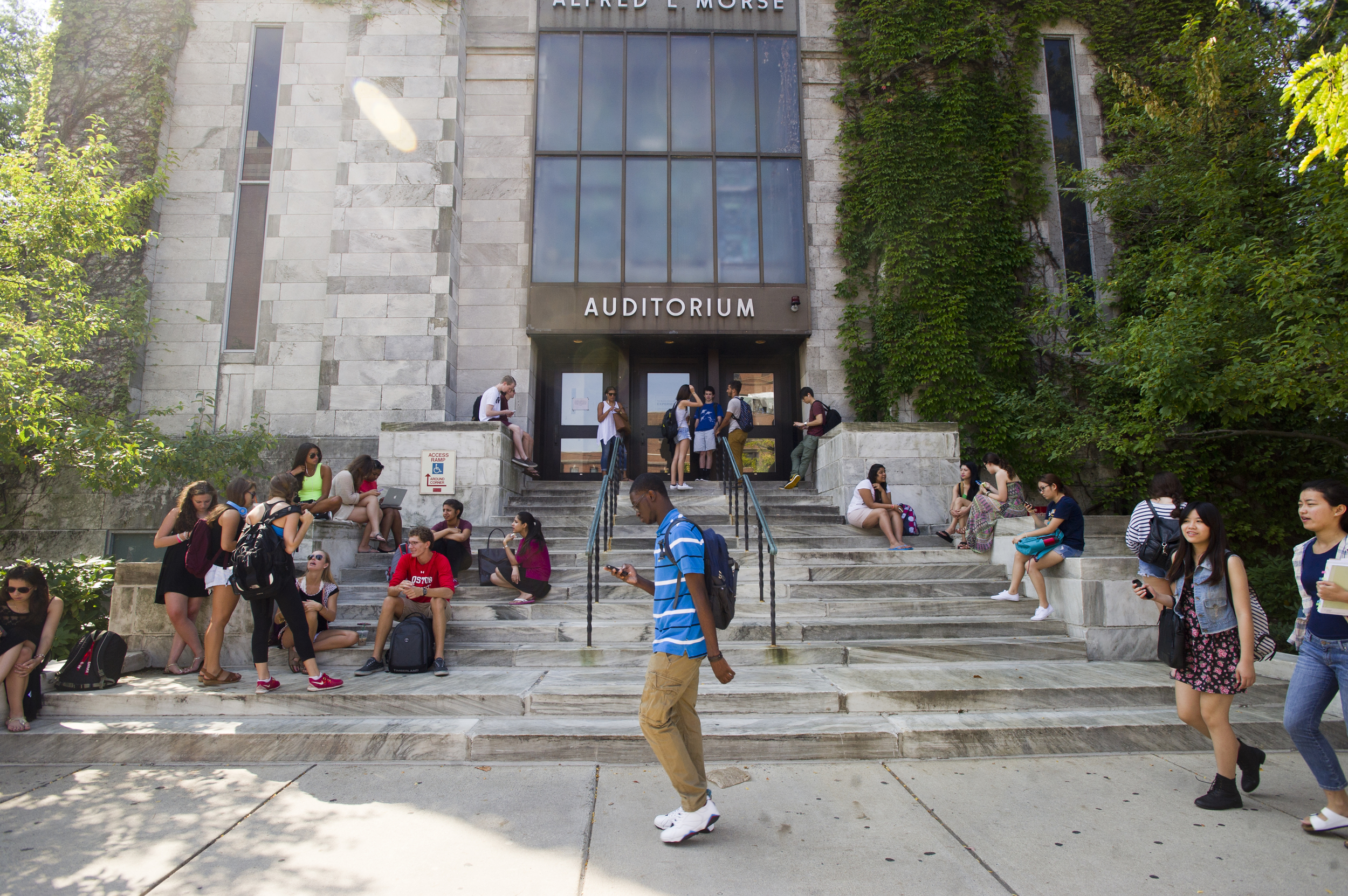  Students come and go from class outside Alfred L Morse Auditorium in the morning of September 5, 2014. &nbsp;Photo by Cydney Scott for Boston University Photography 