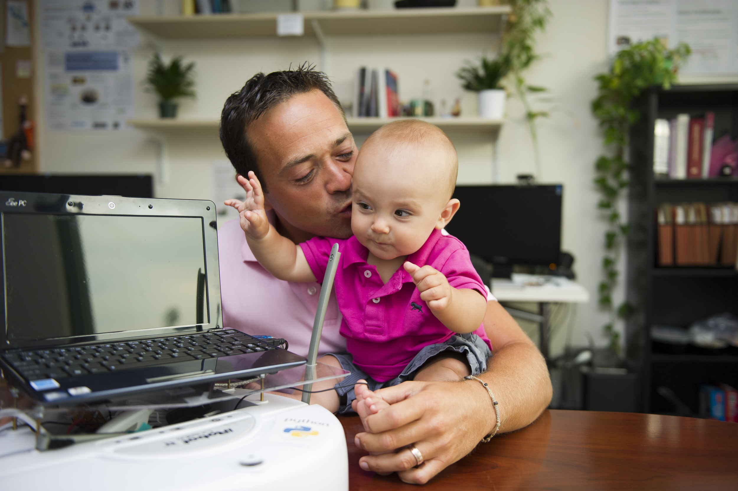  Portrait of Department of Cognitive and Neural Systems Senior Research Scientist Massimiliano “Max” Versace with his son Gabriel Versace at 7 months  Photo by Cydney Scott &nbsp;for Boston University Photography 