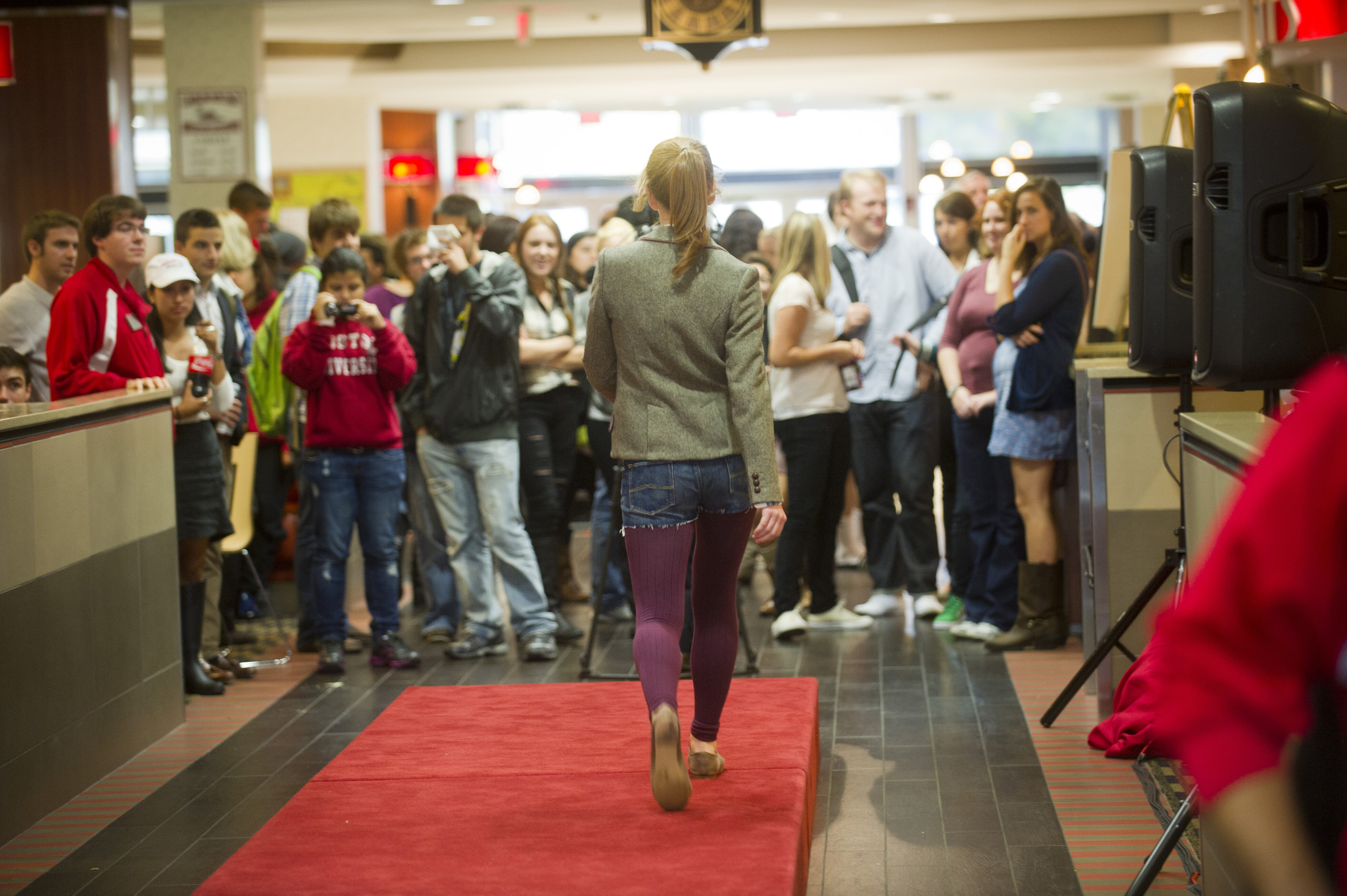  Taylor Stein (SMG14) hits the impromptu runway during the Fashion Show Flash mob at the GSU October 14, 2011. 