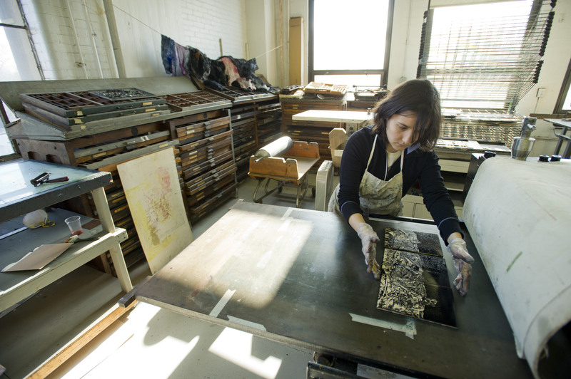  &nbsp;Alla Lazebnik (CFA grad, '12) works on her printmaking piece on the third floor of 808 Commonwealth Tuesday January 3, 2012. Lazebnik is getting her masters in painting.  Photo by Cydney Scott for Boston University Photography 