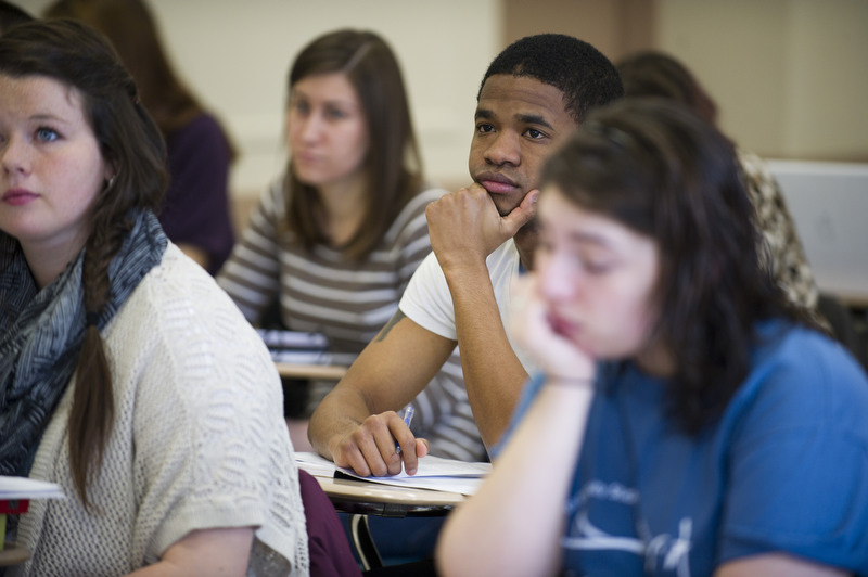  Stephen Knox (COM'12), listens to Jennifer Knust during her course "From Christ to Jesus" in discussion February 23, 2012. The course traces the rise of Christianity.  Photo by Cydney Scott for Boston University 