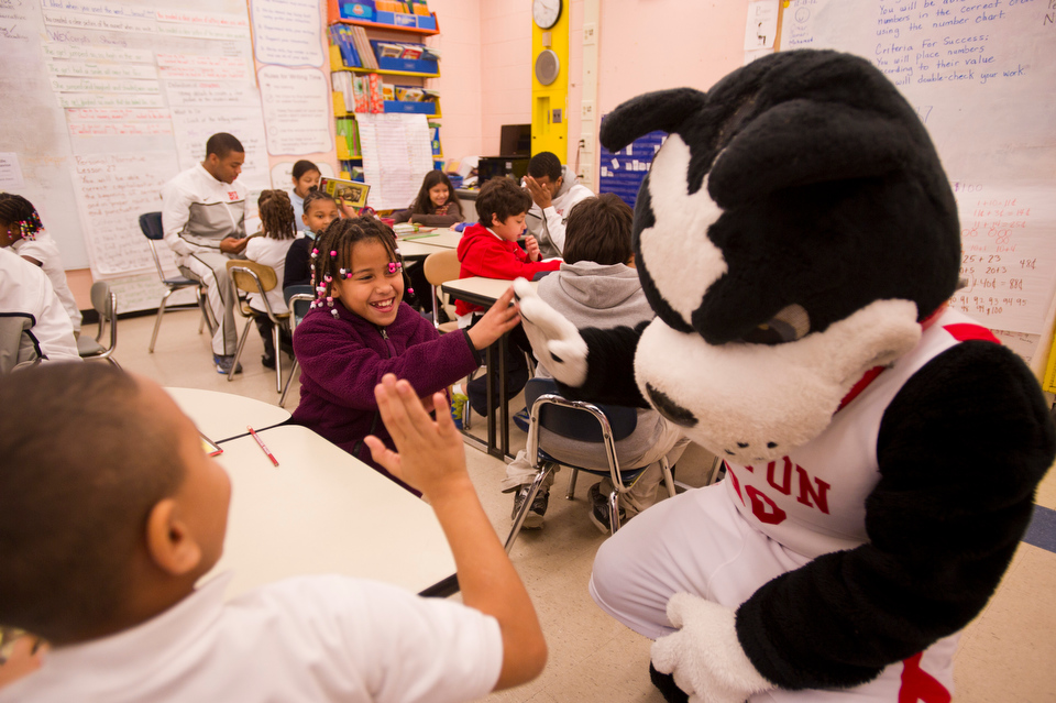  Rhett stops in for a visit in Sterling Scott's second grade classroom at Blackstone Elementary on December 13, 2012 for the 16th Annual Boston University Athletics Holiday Reading Program in conjunction with the Office of Government and Community Af