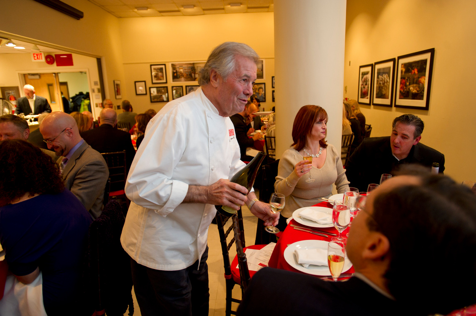  Chef Jacques Pepin makes the rounds during the event Celebrating Julia Child's Centenary at 808 Comm Ave November 7, 2012.  Photo by Cydney Scott for Boston University 