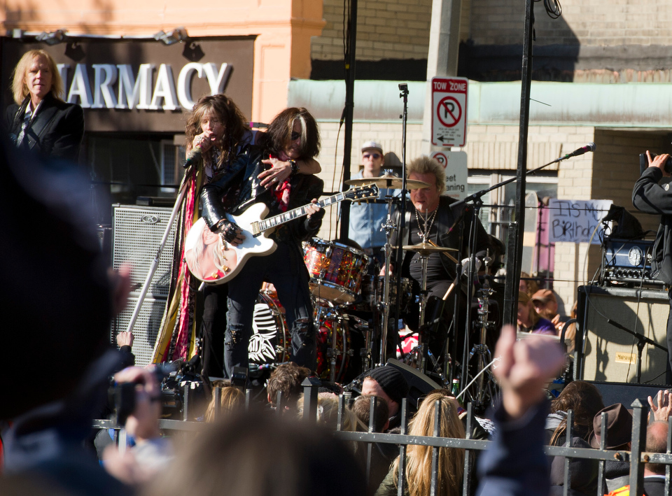  Aerosmith performs a free outdoor concert November 5, 2012, in front of 1325 Comm Ave. where the band members used to live in the early 1970s. The concert comes on the eve of the release of the band’s 15th album, Music from Another Dimension. &nbsp;