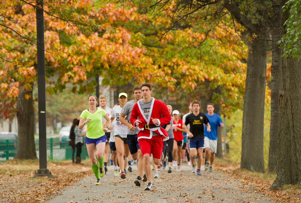  Participants in the 5K Run take off on the Charles River side of Storrow Dr. during the Trick or Trot&nbsp;Physical Therapy Fair October 26, 2012. About 65 people participated in the run, according to organizers.  Photo by Cydney Scott for Boston Un