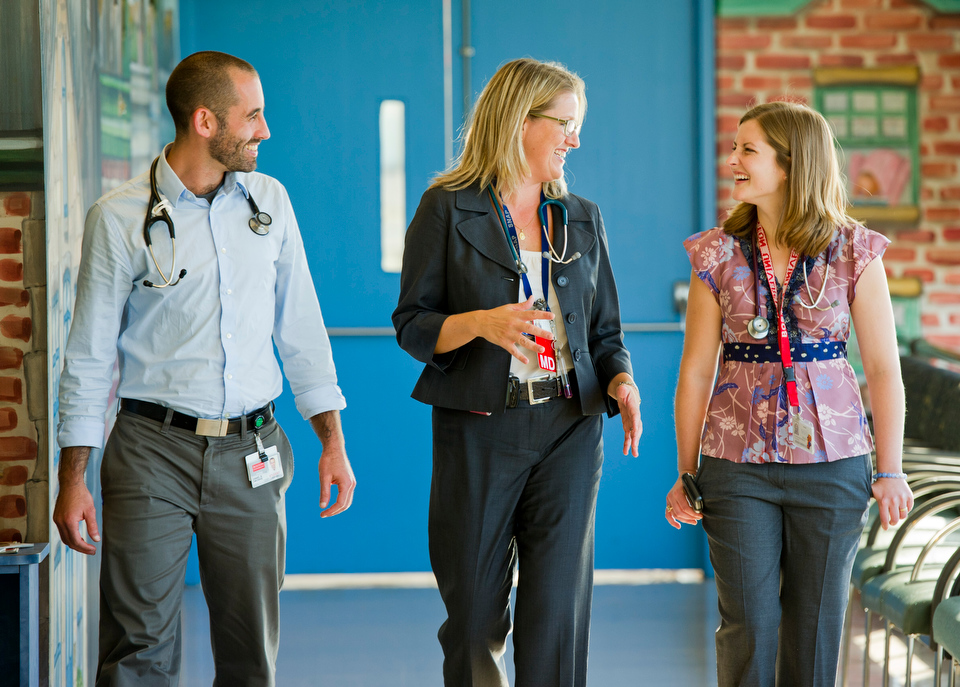  Student Advocacy Track Directors, Faculty Member Associate Professor of Pediatrics Megan Sandel (n gray), Lauren Feichtner who is Alumni Director, doing a fellowship at Children’s Hospital , and Dan Dworkis -- 4th year MED student.  Photo by Cydney 