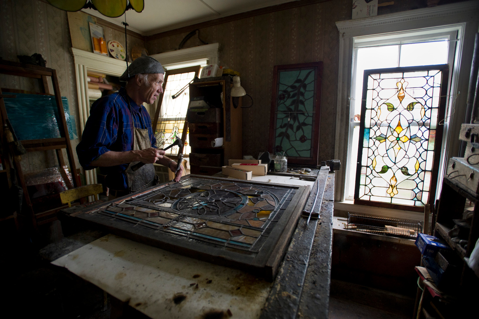  Peter Ureneck (CGS’69) at his home and in his workspace in Dorchester July 9, 2013.&nbsp; Photo by Cydney Scott for Boston University Photography 