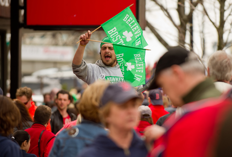  Vendors give out free flags with a $3 Red Sox program April 20, 2013 in Kenmore Square. 