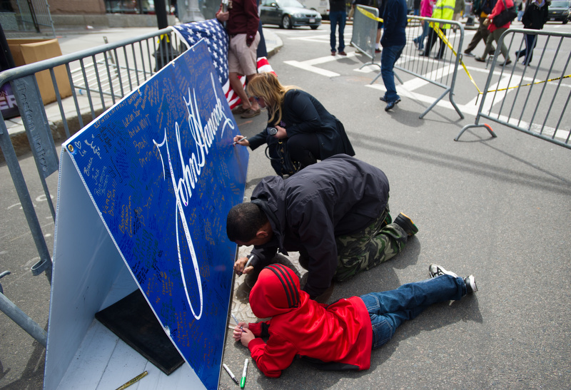  Scenes from the make-shift memorial by the barricades blocking off Boylston Street at Hereford Street April 20, 2013.&nbsp; 