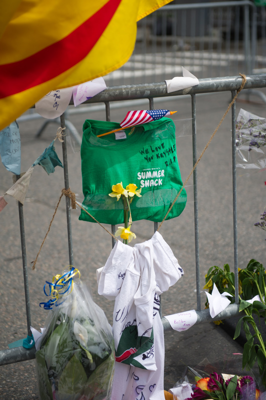  Scenes from the make-shift memorial by the barricades blocking off Boylston Street at Hereford Street April 20, 2013. 