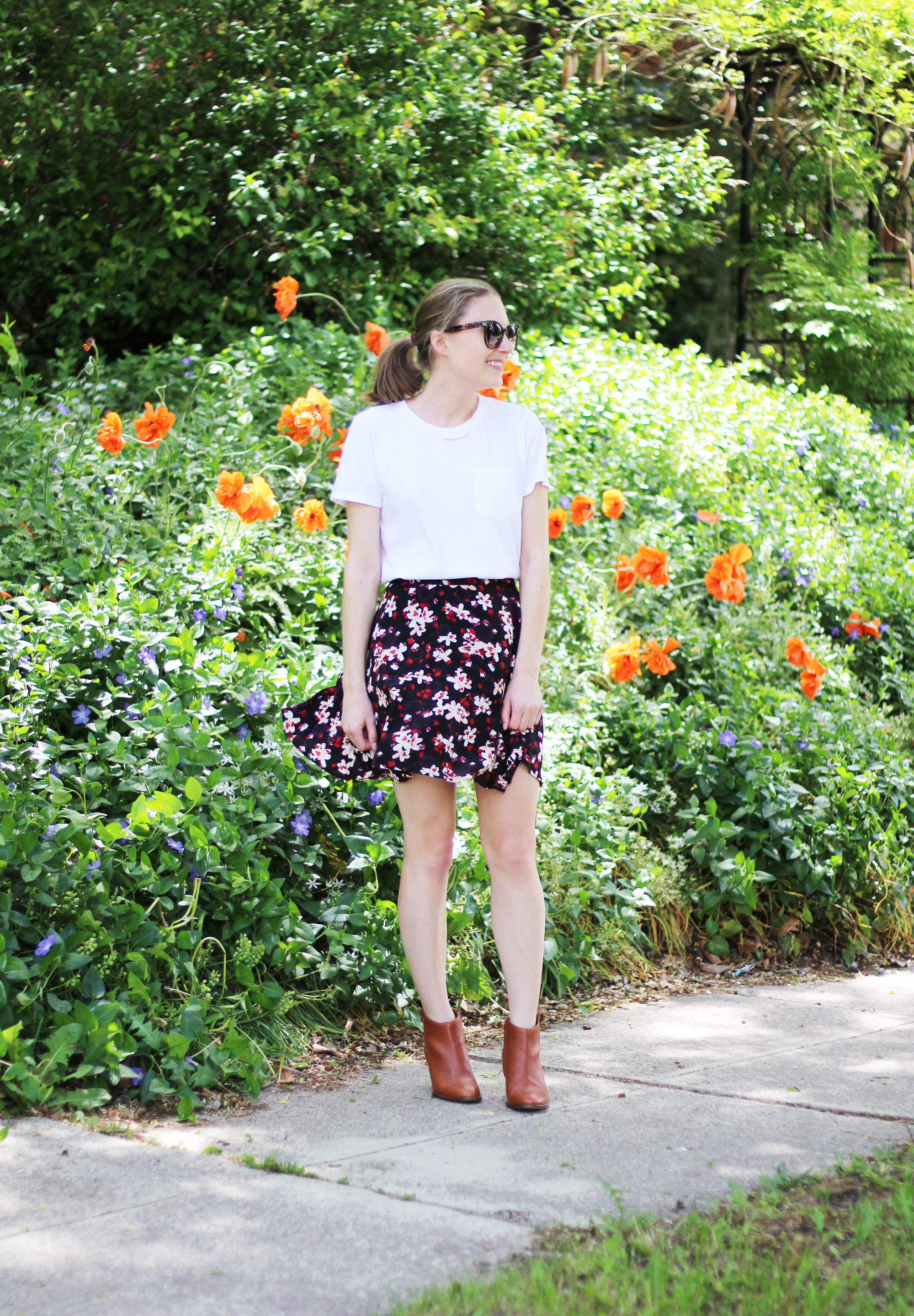 Spring grad school outfit idea with a white tee and floral mini skirt | Cotton Cashmere Cat Hair