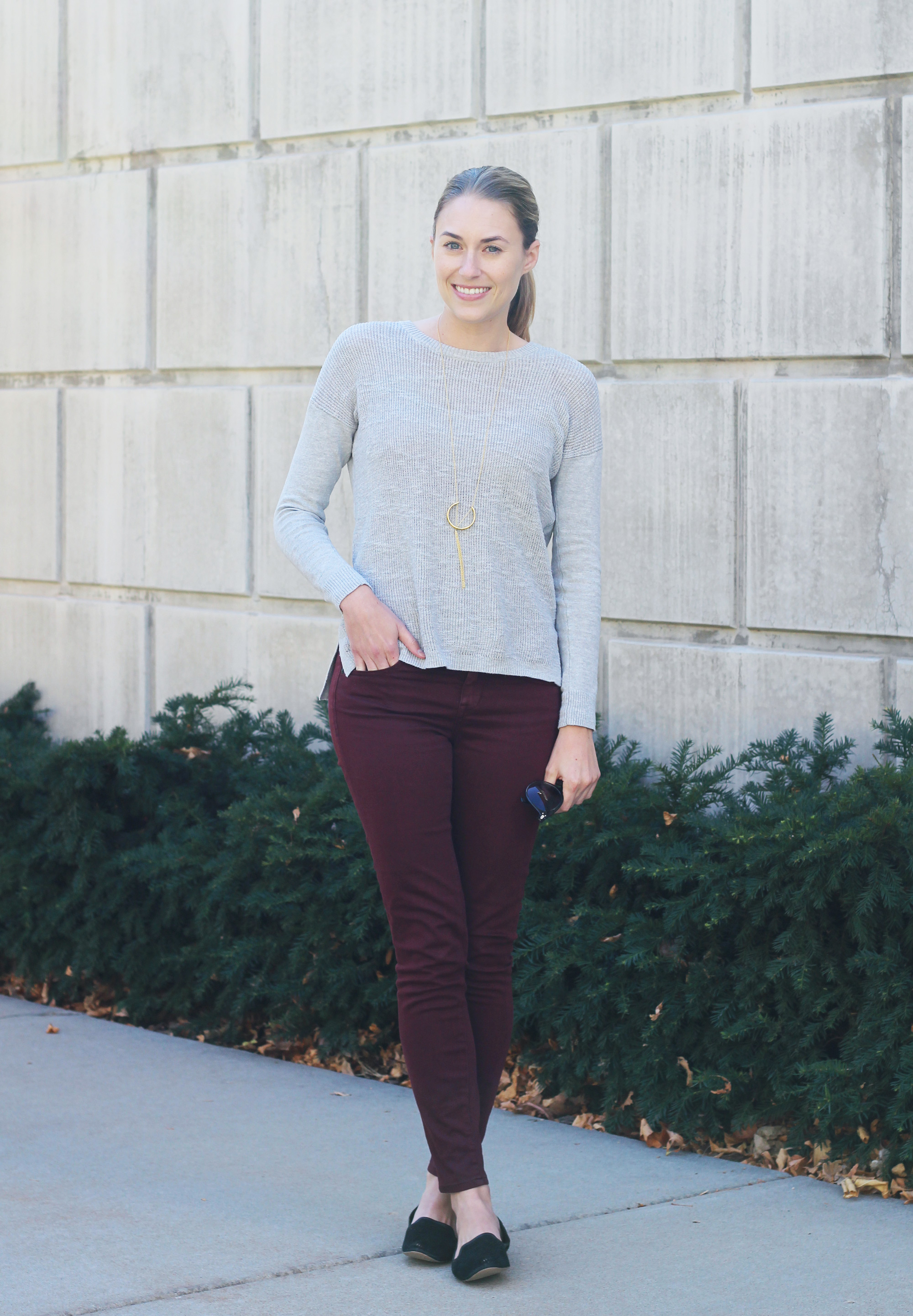 grey sweater burgundy pants