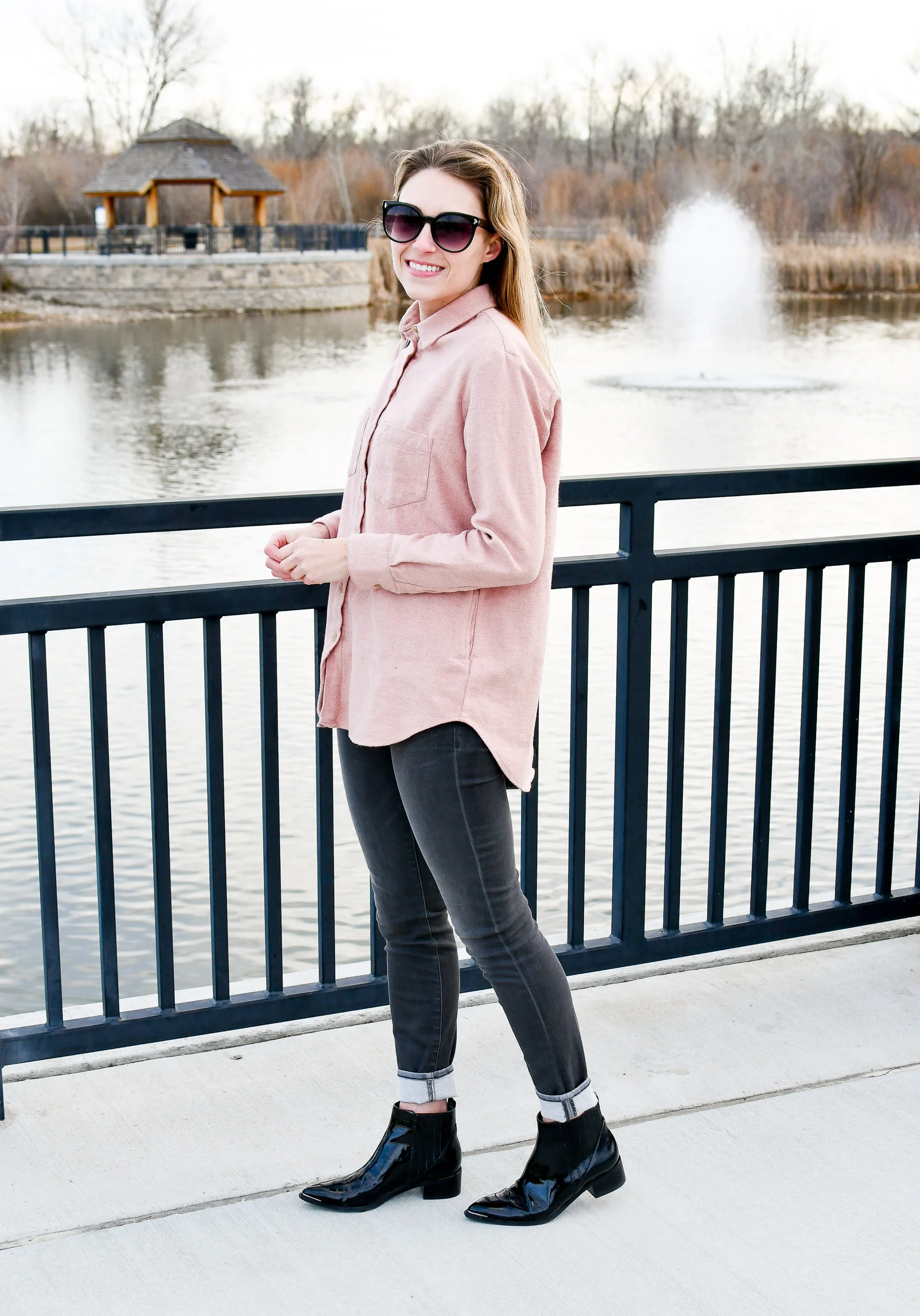 black jeans pink shirt