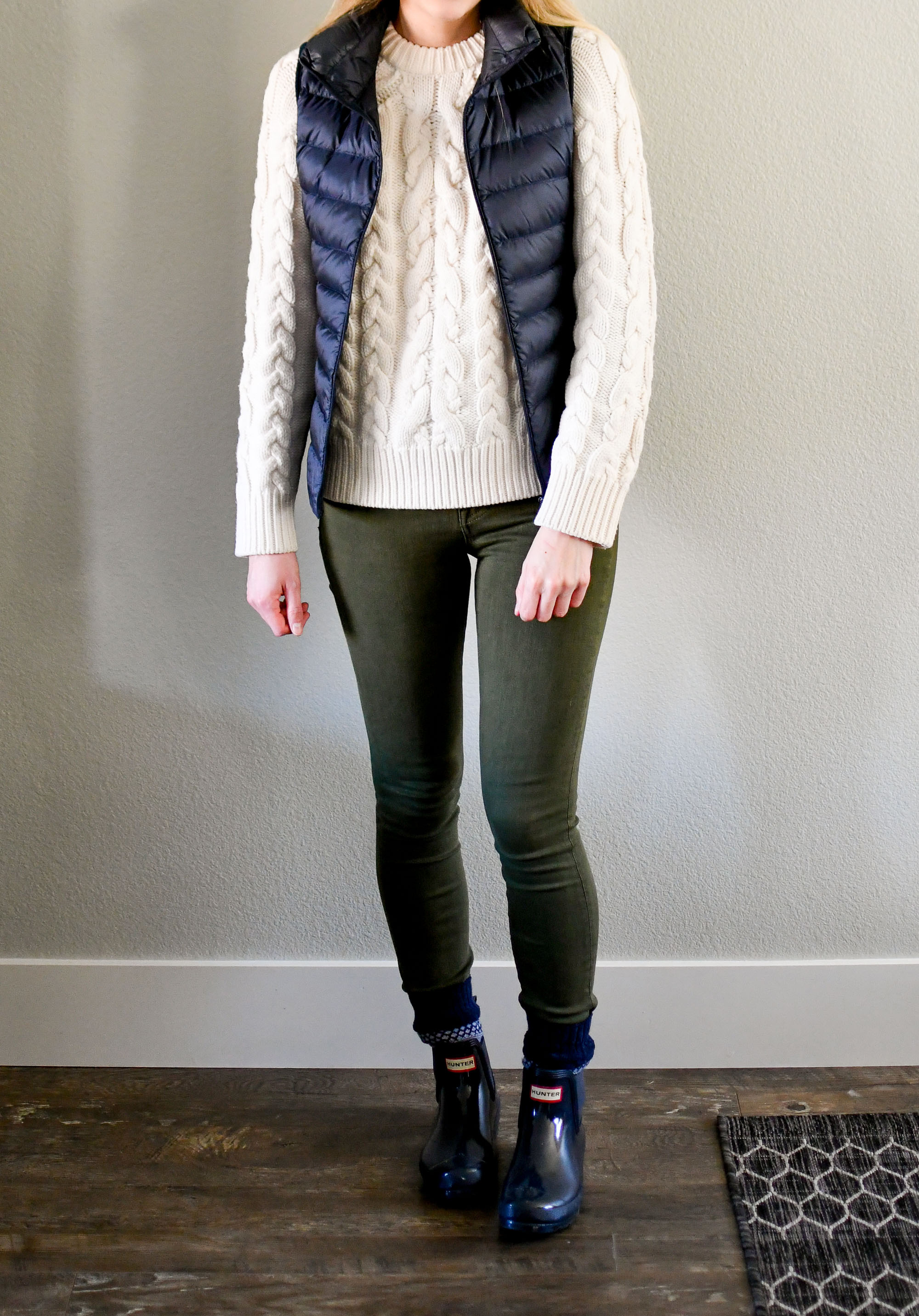 Navy vest, ivory sweater, olive green jeans, navy Hunter boots — Cotton Cashmere Cat Hair
