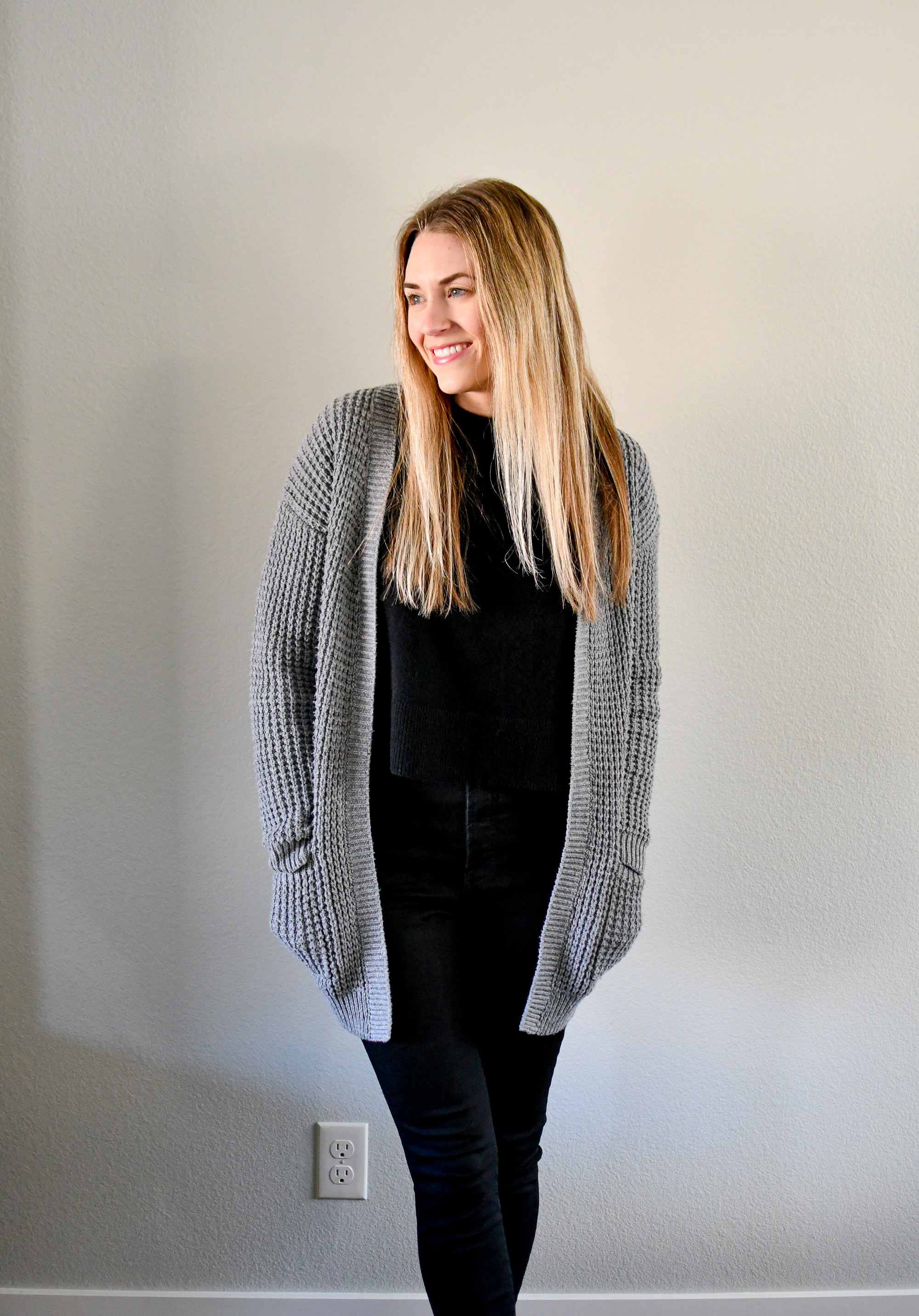Casual winter outfit with grey cardigan, black sweater, black denim — Cotton Cashmere Cat Hair