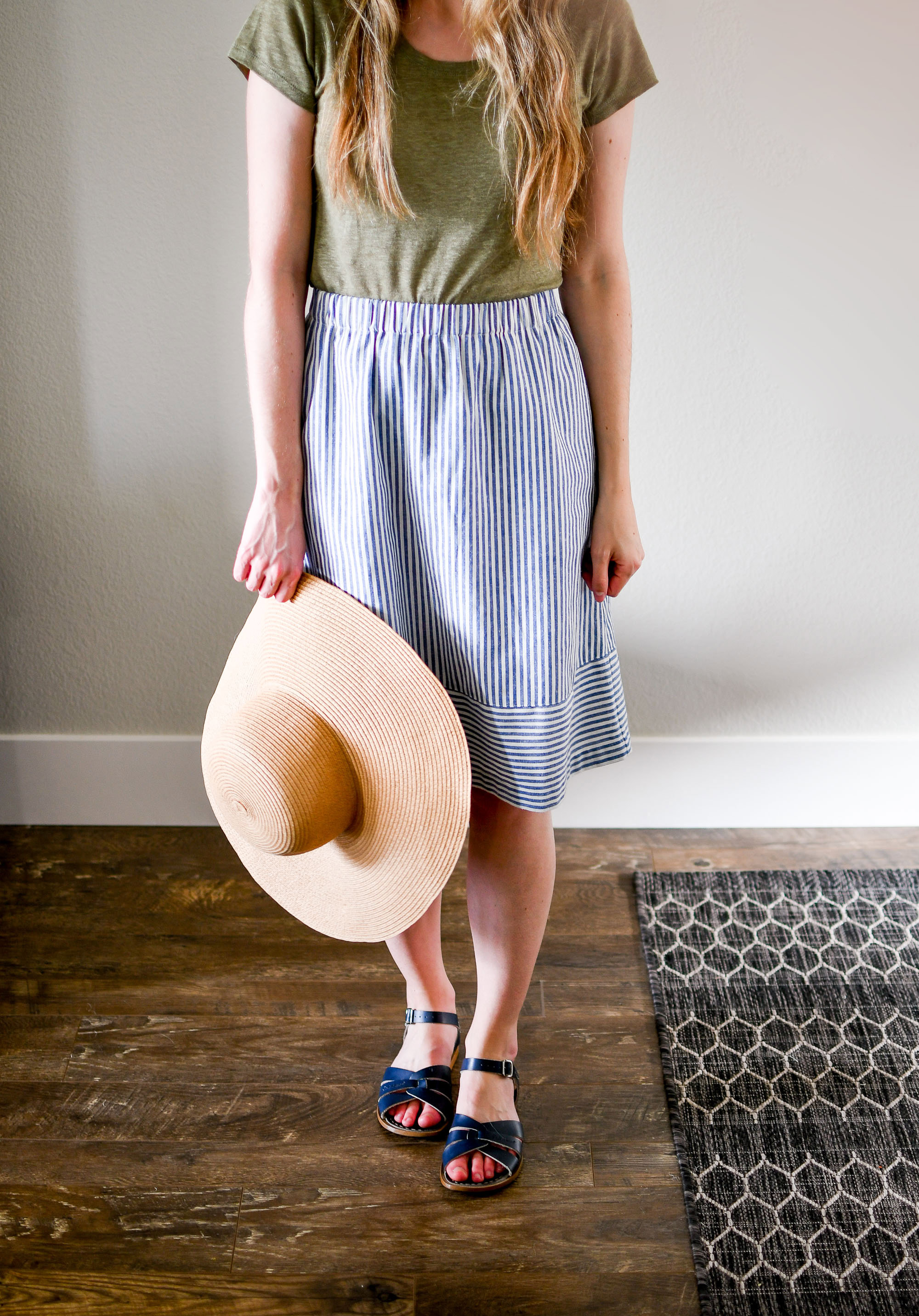 Straw sun hat outfit with striped skirt — Cotton Cashmere Cat Hair