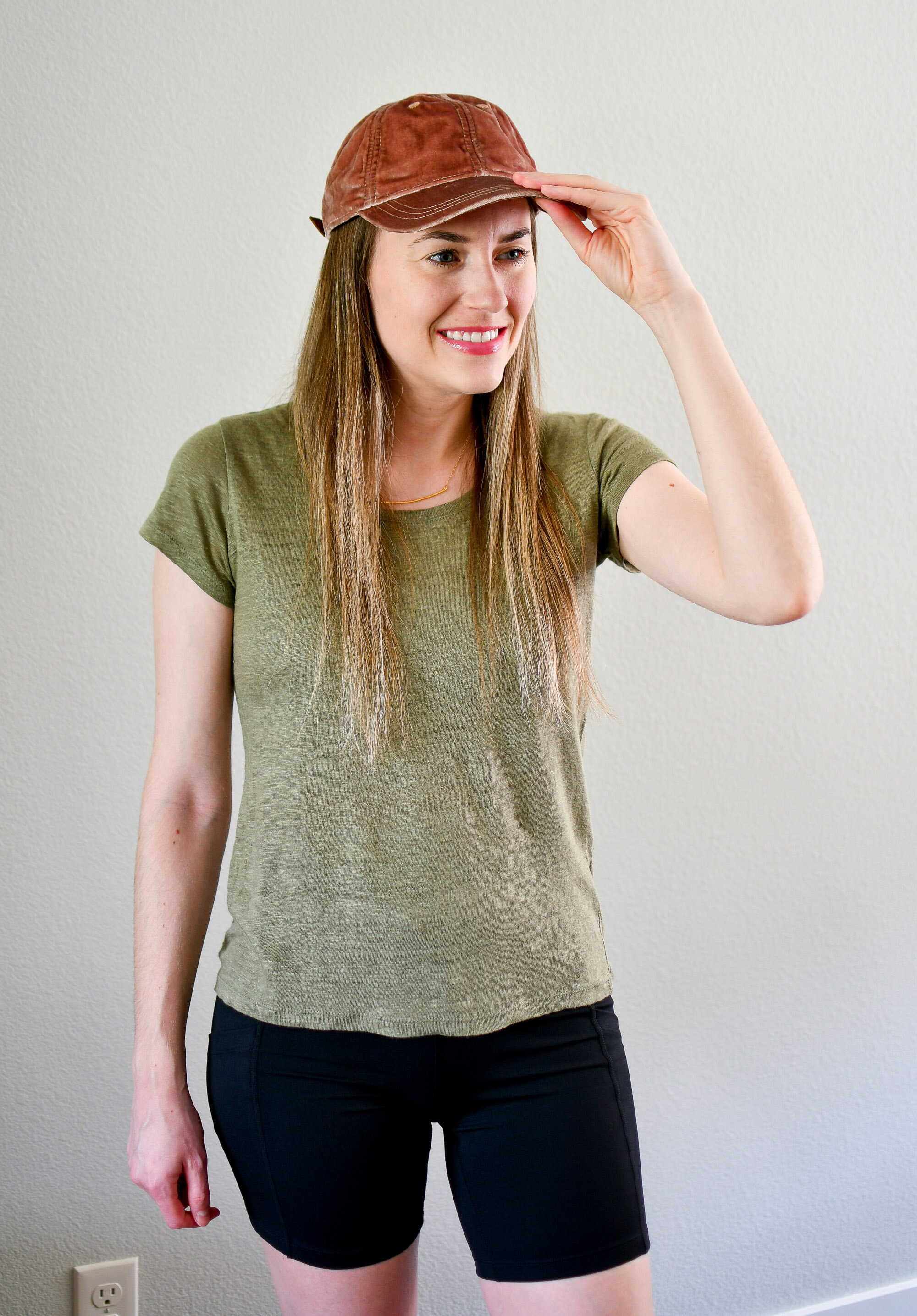 Green linen tee spring outfit with pink velvet baseball cap and Zella bike shorts — Cotton Cashmere Cat Hair