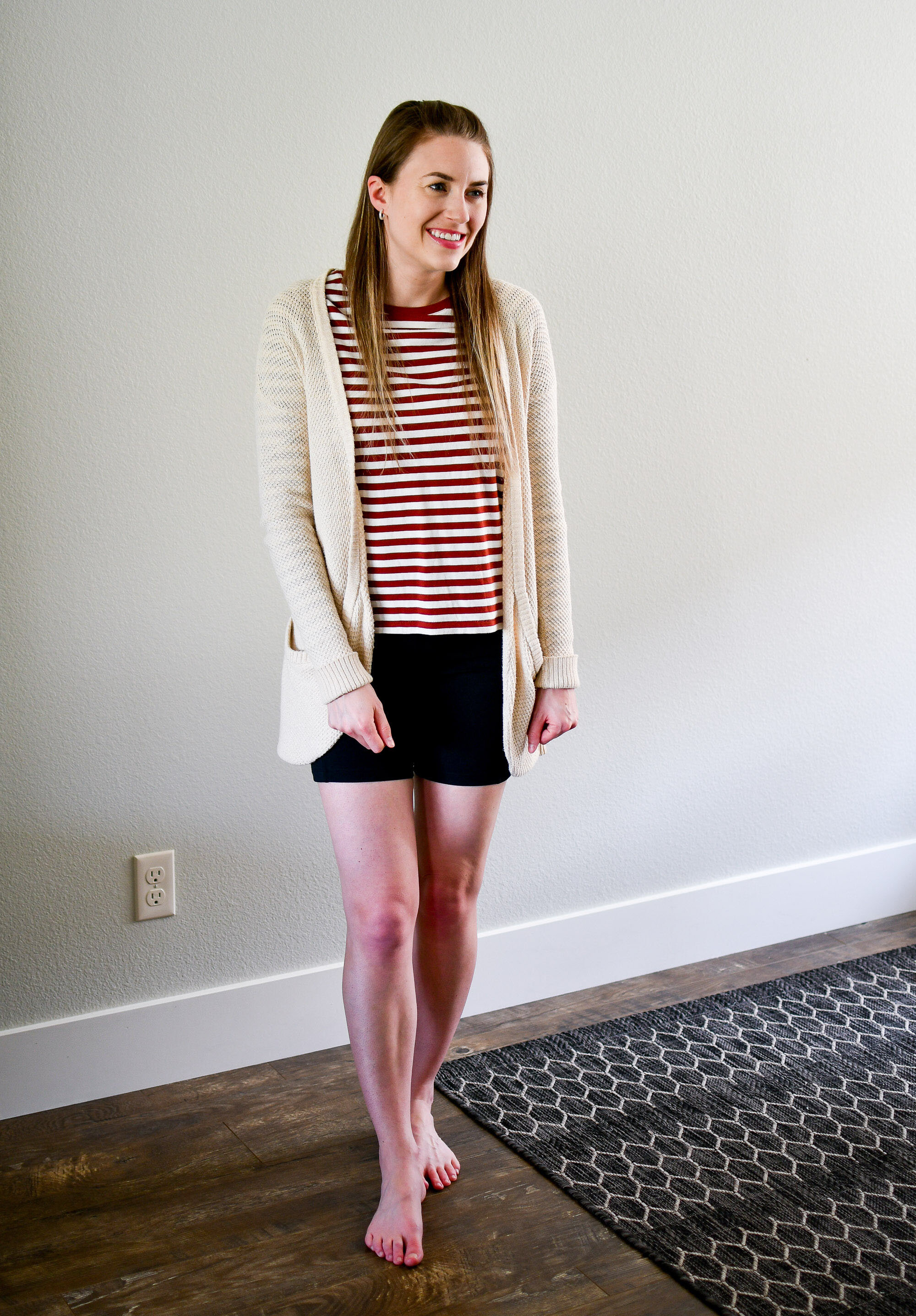 Cream cardigan, dark red striped tee, black bike shorts casual spring outfit — Cotton Cashmere Cat Hair