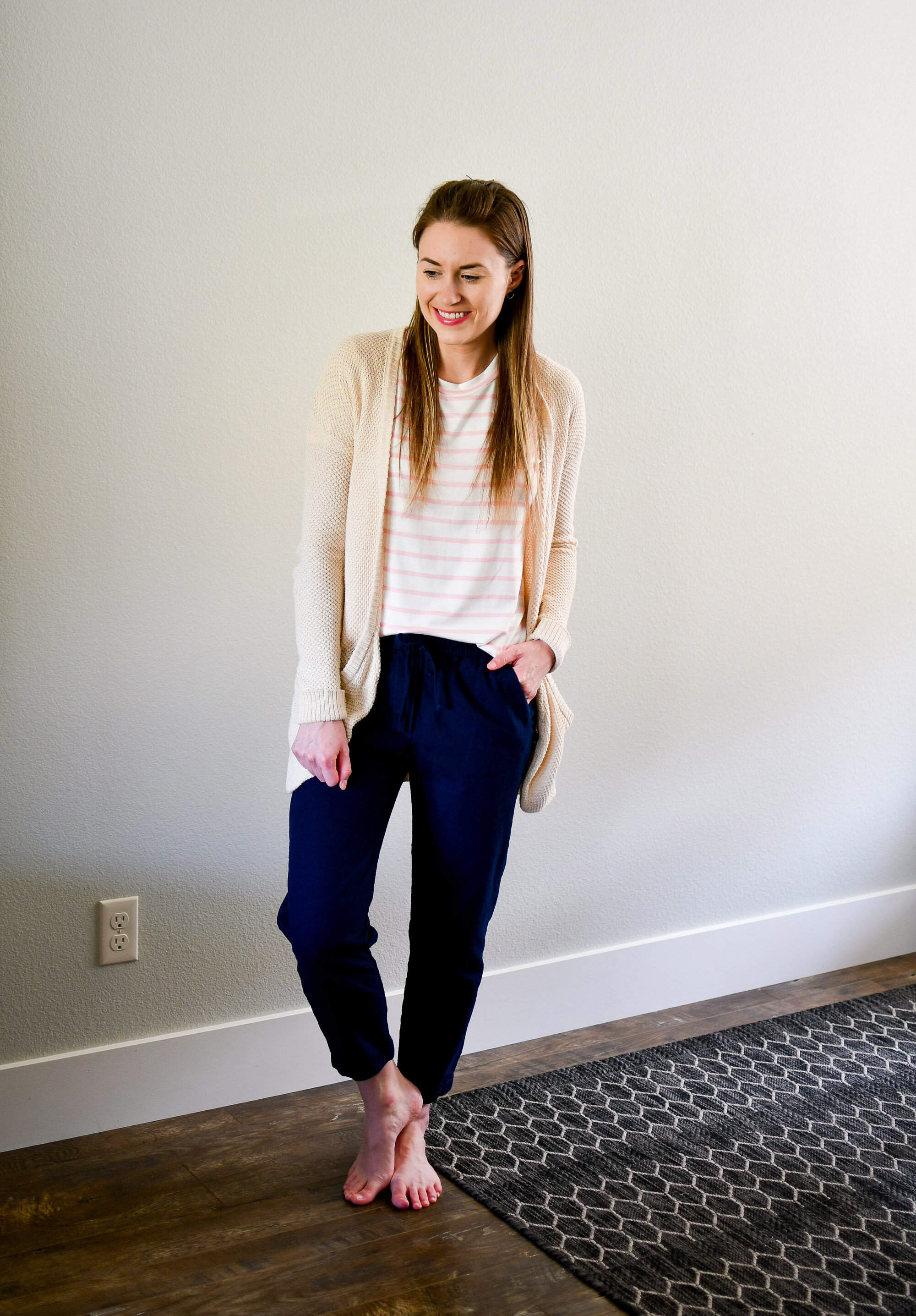 Casual spring work from home outfit with cream cardigan, pink striped tee, navy linen pants — Cotton Cashmere Cat Hair