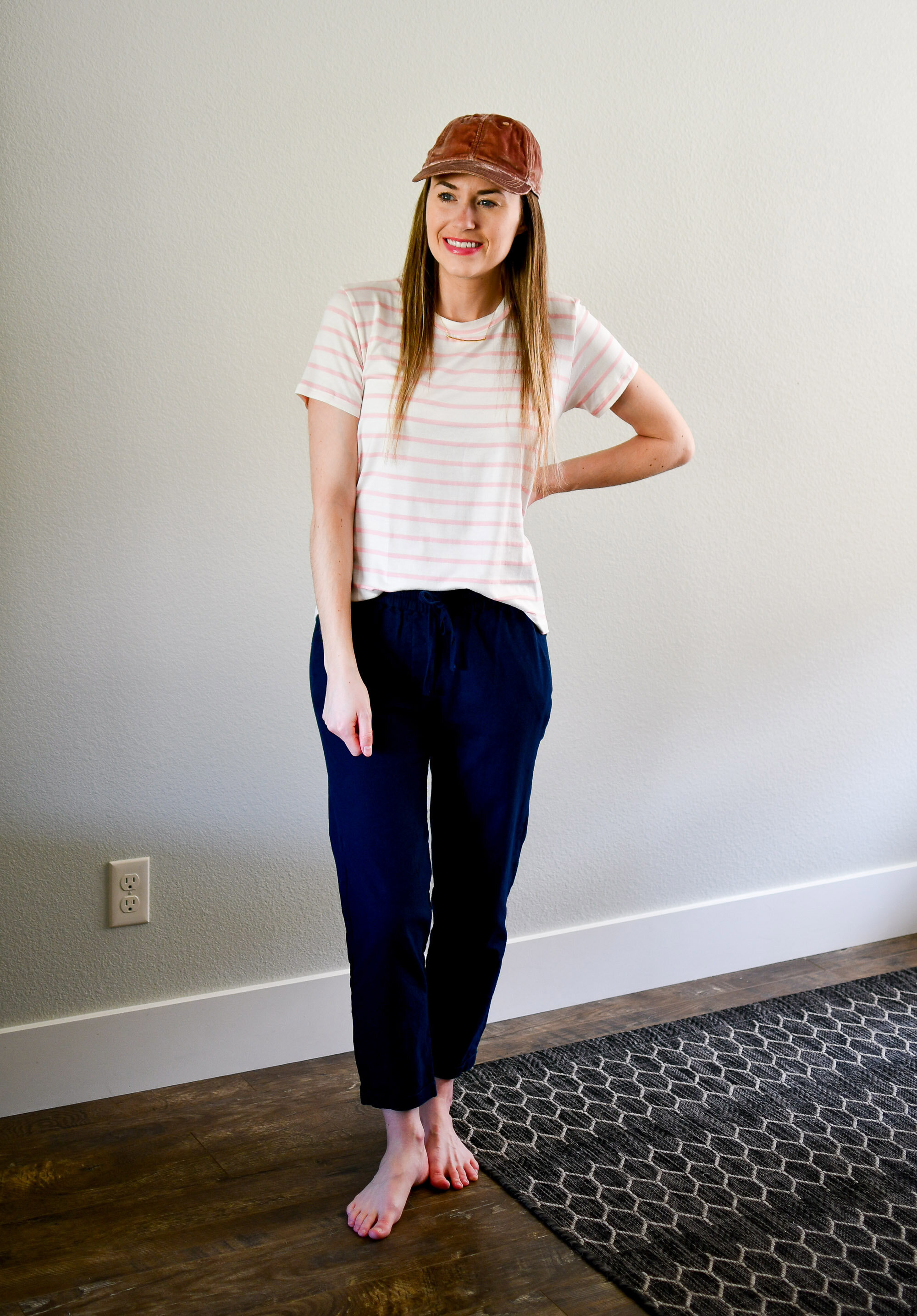 Casual spring outfit with pink velvet baseball cap, pink striped tee, navy cotton-linen pants — Cotton Cashmere Cat Hair