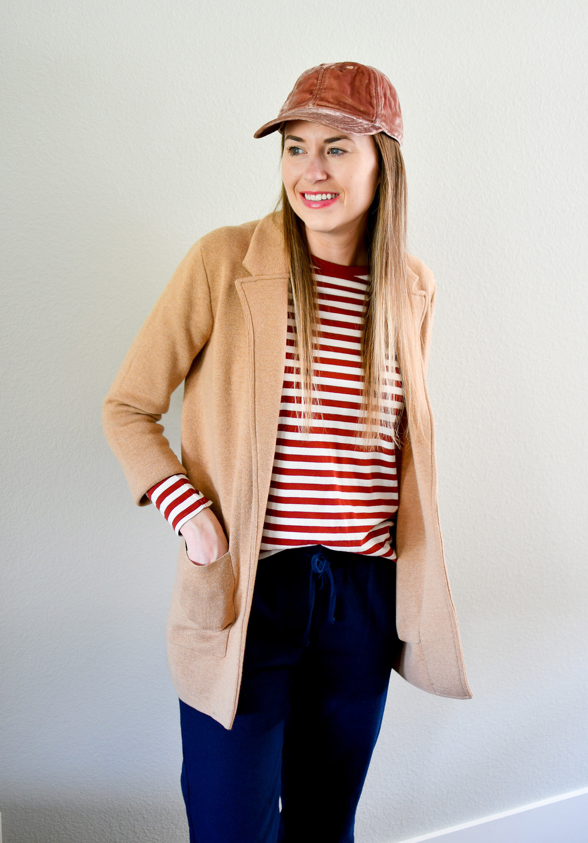 Camel sweater blazer, red striped tee, navy pants, pink hat spring outfit — Cotton Cashmere Cat Hair