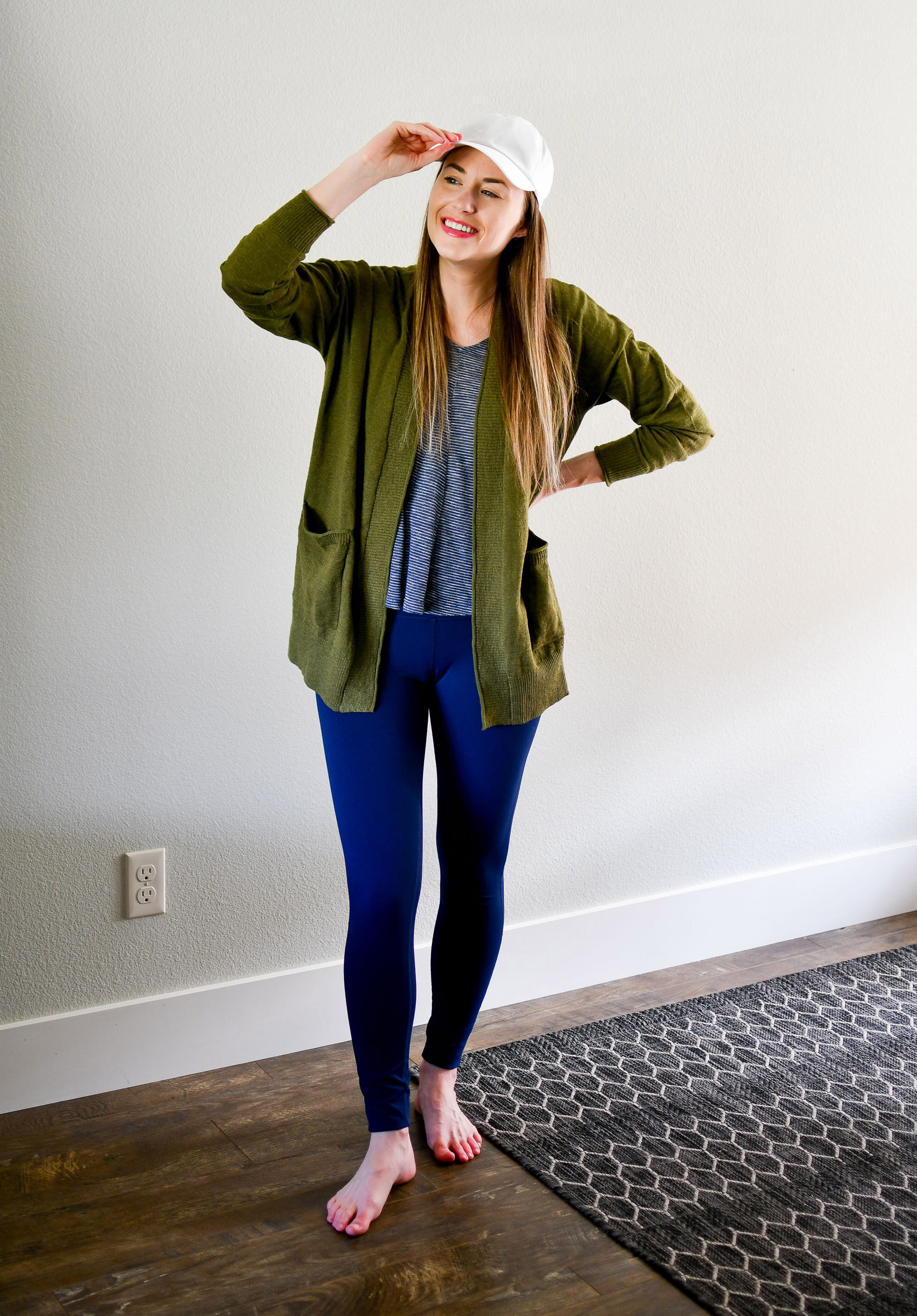 Casual spring work from home outfit with green cardigan and navy leggings — Cotton Cashmere Cat Hair
