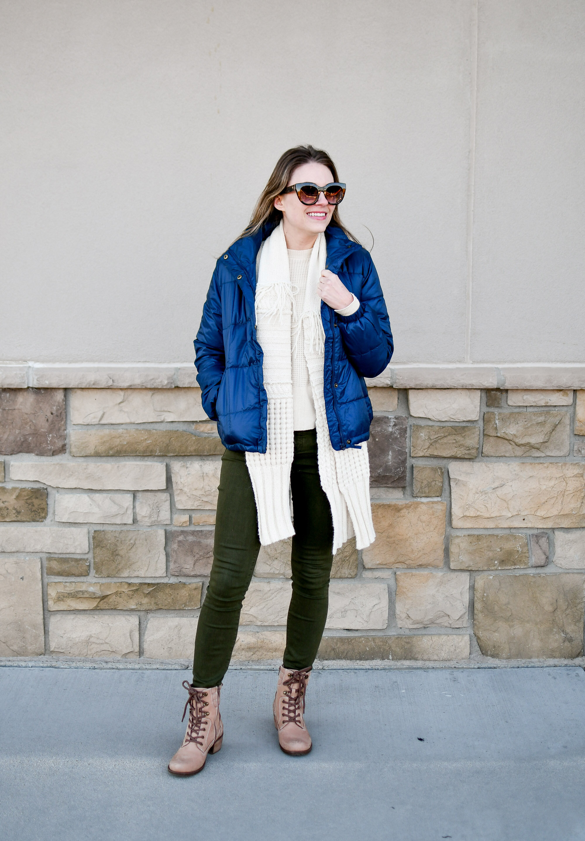 Casual winter outfit with navy puffer coat, olive skinny jeans, Earth Anchor lace-up boots — Cotton Cashmere Cat Hair