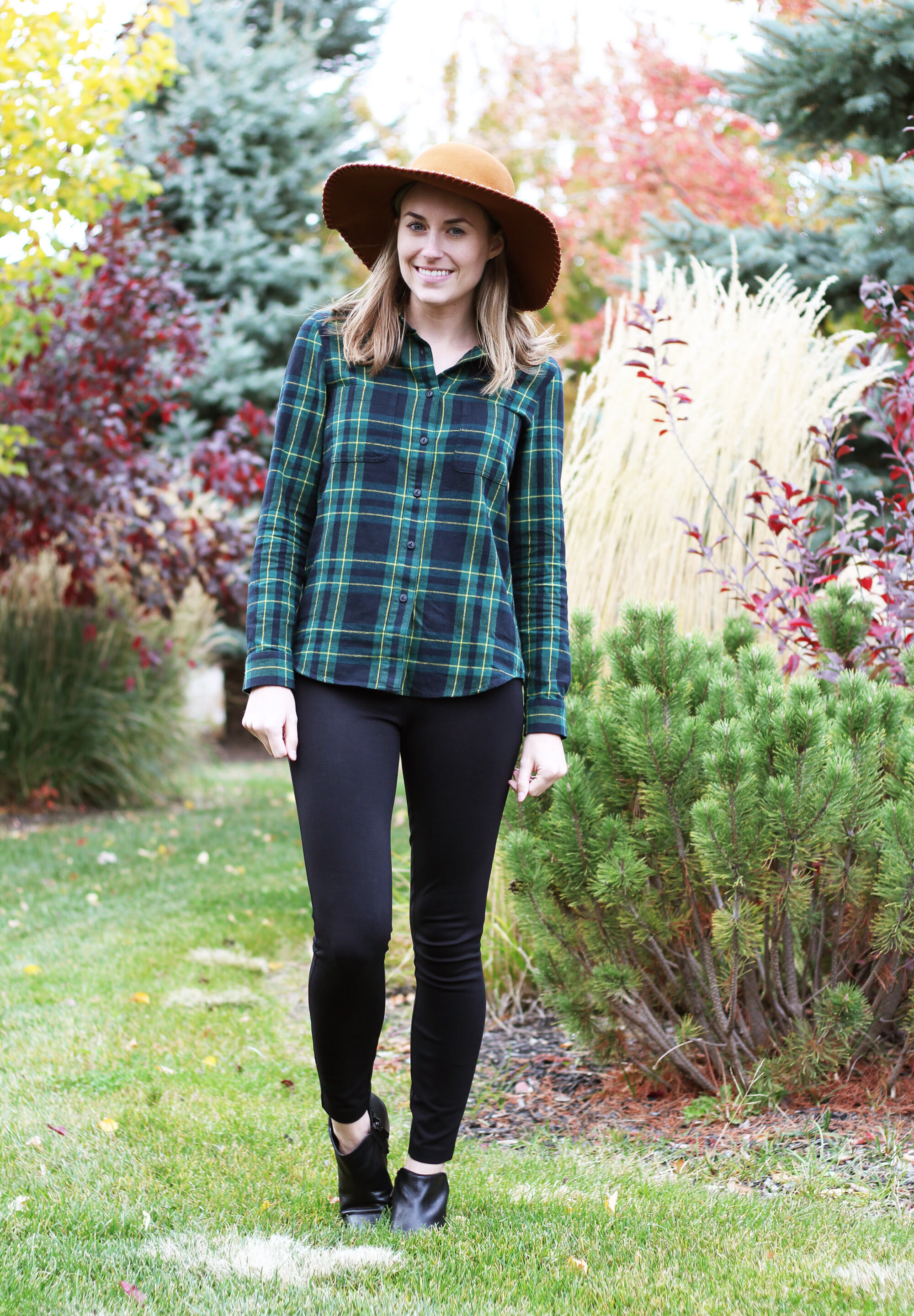 Thanksgiving outfit idea with ponte pants, green plaid flannel shirt, tawny floppy hat — Cotton Cashmere Cat Hair