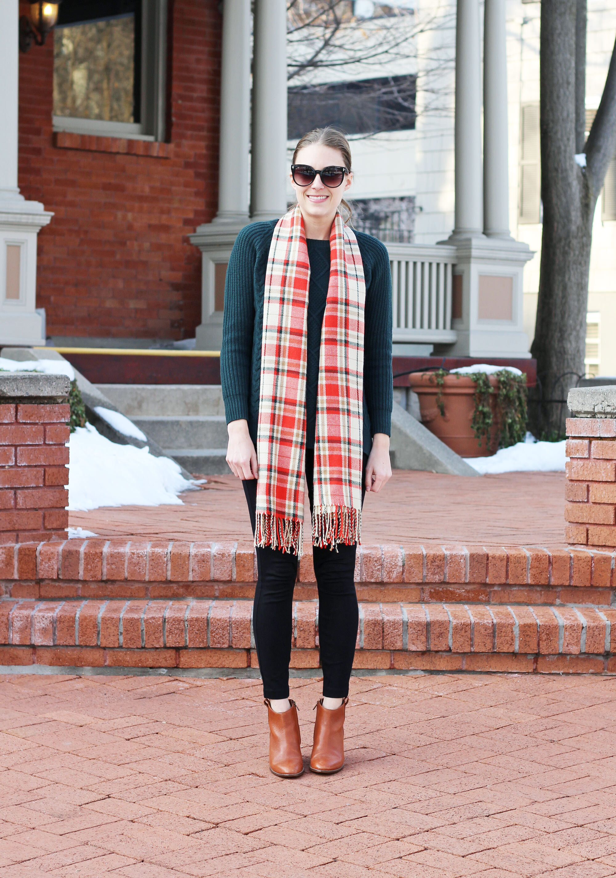 Thanksgiving outfit idea with ponte pants, orange plaid scarf, forest green cable knit sweater — Cotton Cashmere Cat Hair
