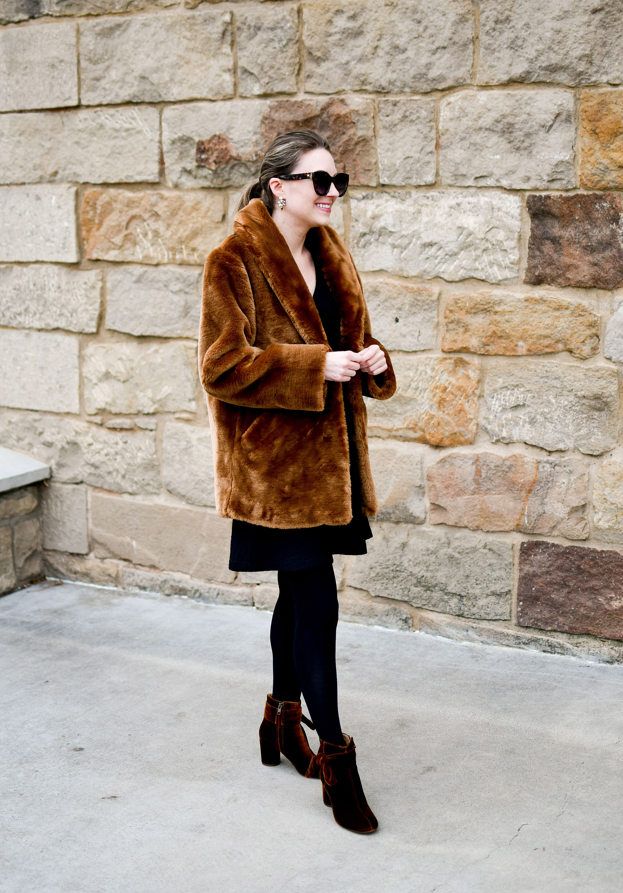 Holiday outfit idea: faux fur coat, velvet ankle boots, crystal drop statement earrings — Cotton Cashmere Cat Hair