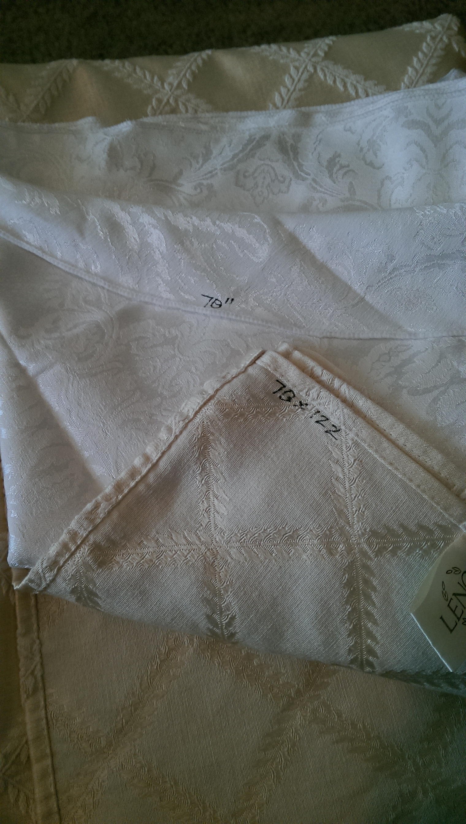 Write the size of the table cloth on the underside with a laundry pin to help keep organized.