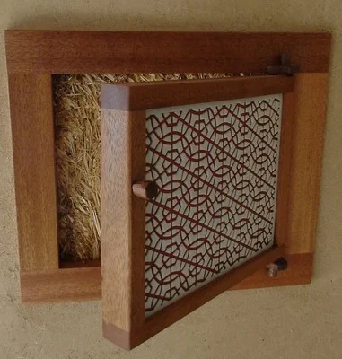 "Truth window", a tradition in straw bale construction that allows visitors to see the actual bales from the interior.