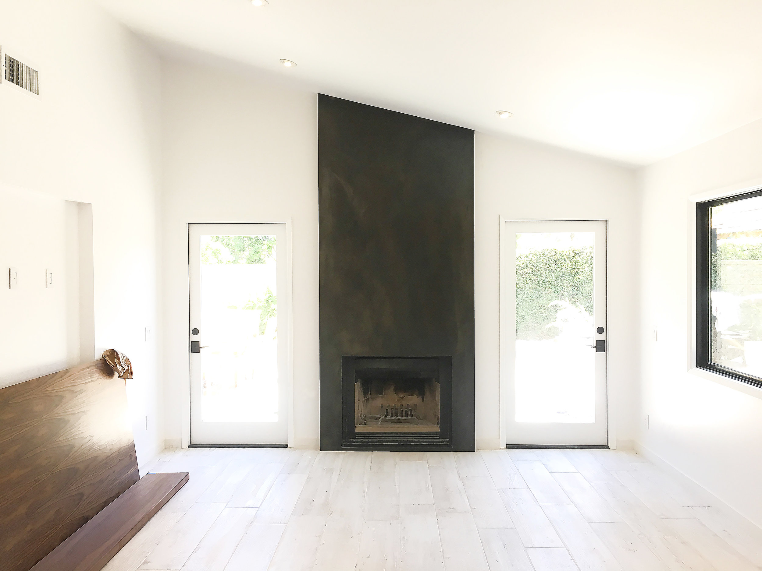 Fireplace surround with floor installed.jpg