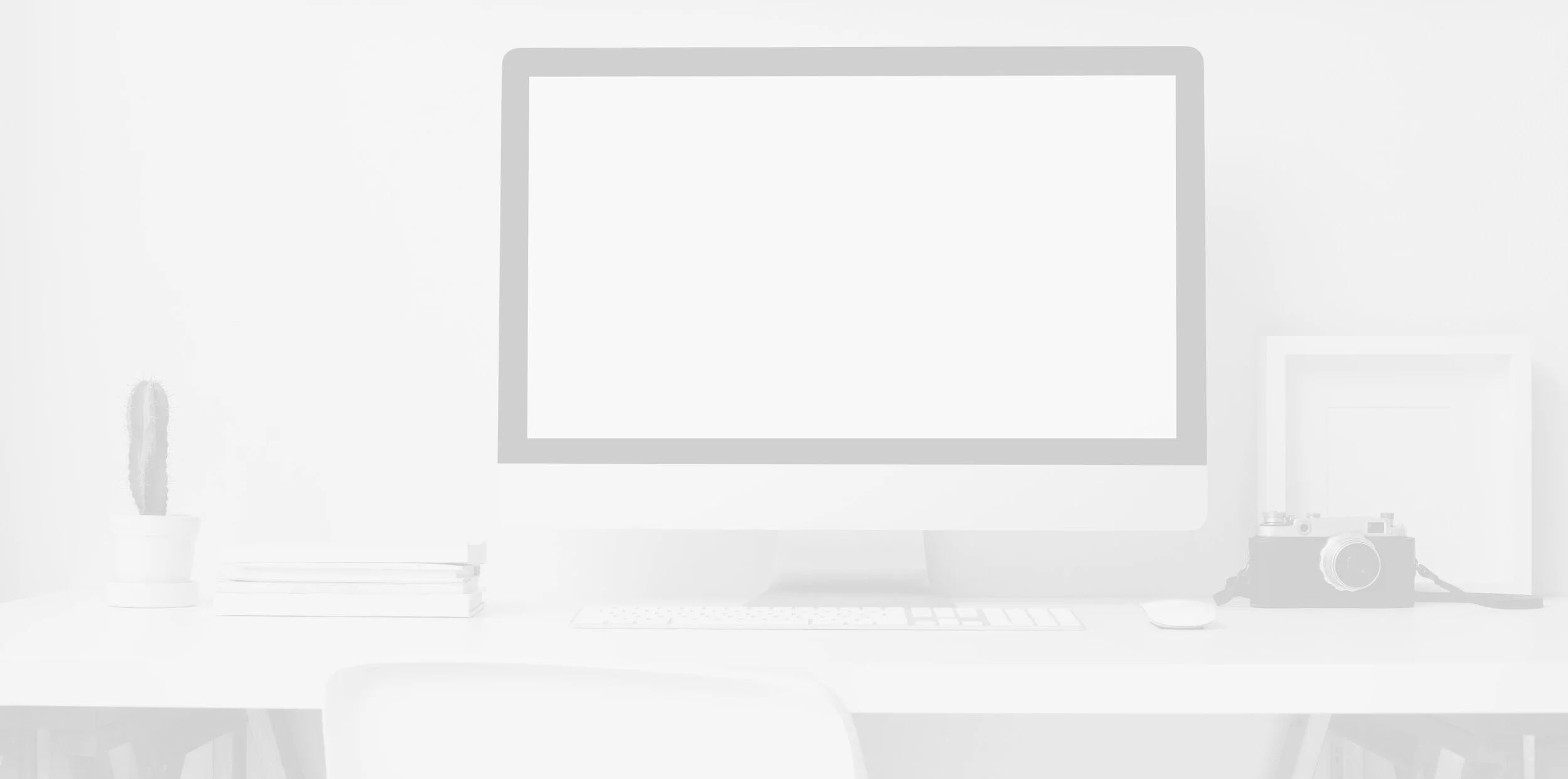 desktop-computer-beside-analog-camera-3759101.jpg