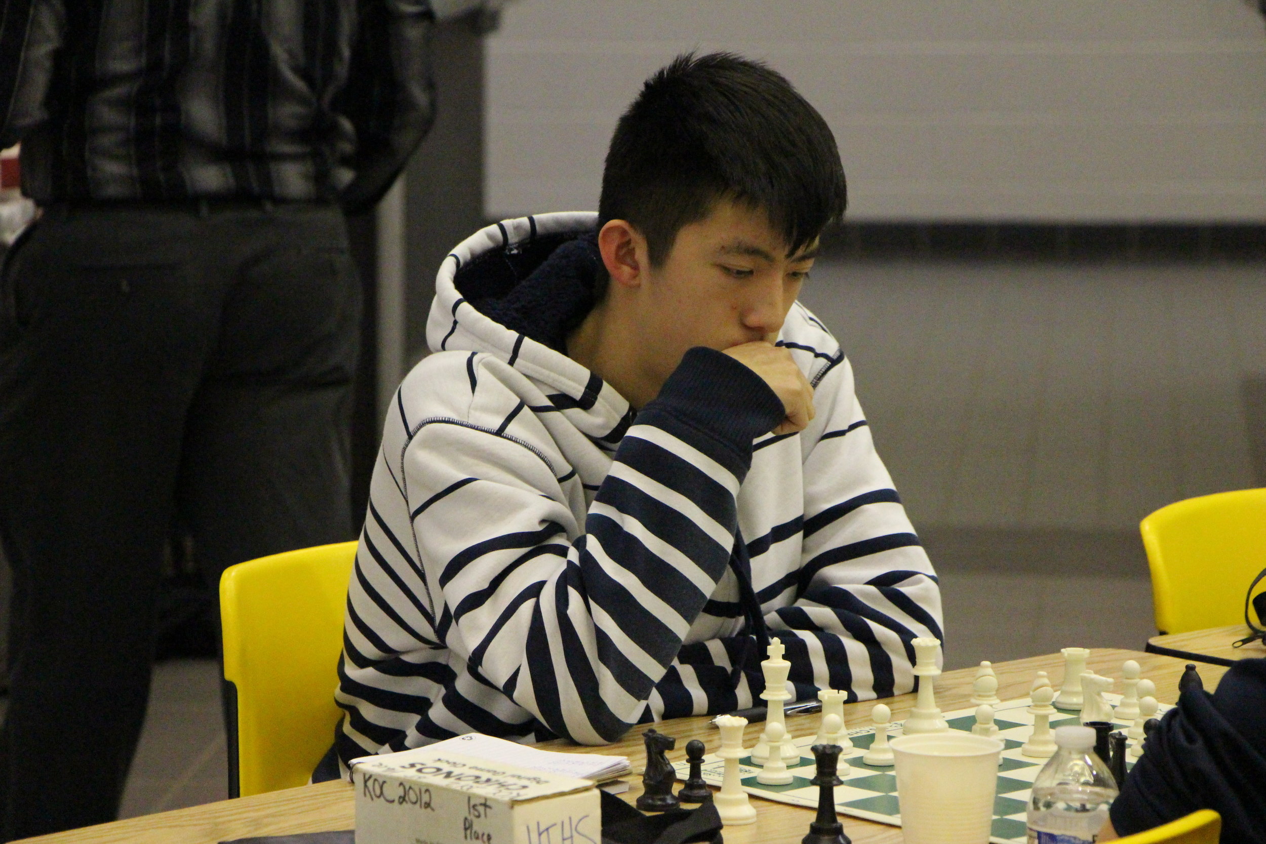 Kevin Watching Chess.JPG