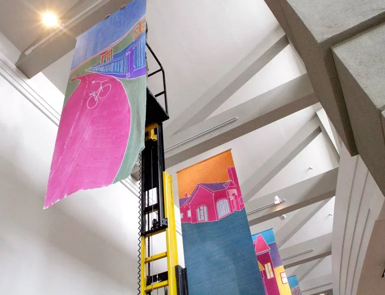The 4-foot by 10-foot paintings will hang from the ceiling in the galleria. photo: ROBIN TRIMARCHI