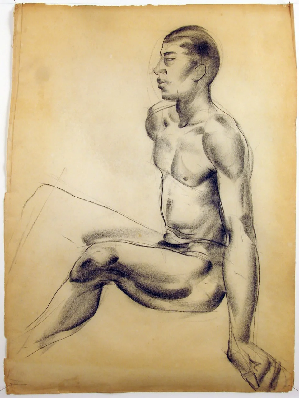 Seated male nude side view.jpg