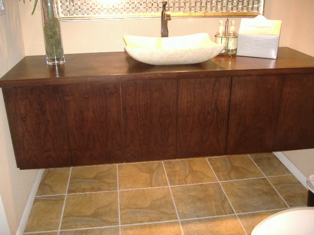 Bohnhoff floating vanity with touch latch doors.JPG