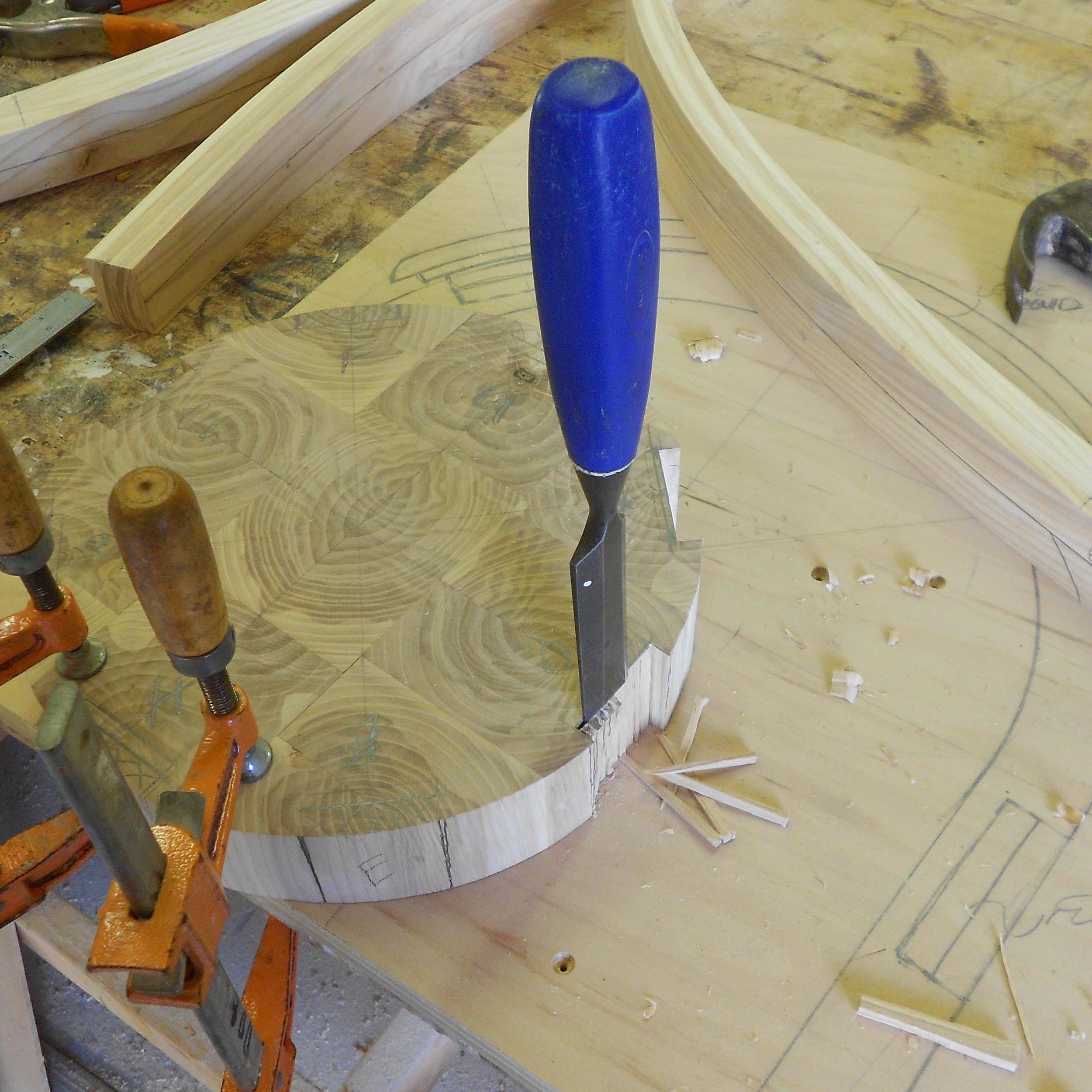 Brockport commission 7 cutting joints in base for tapered curved parts to land in.jpg